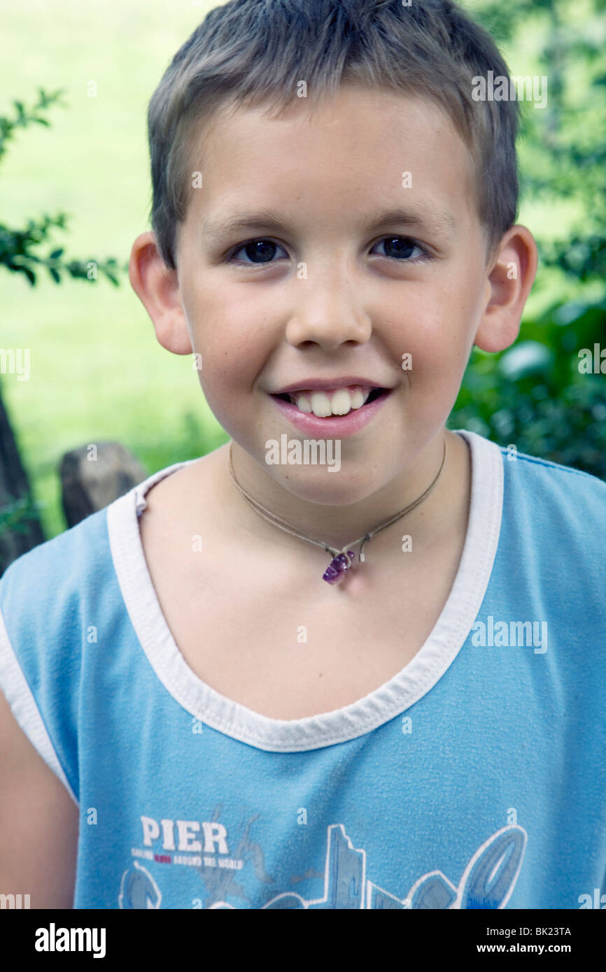 My son Ricky, a 10 year old Caucasian male, summertime, relaxing at ...