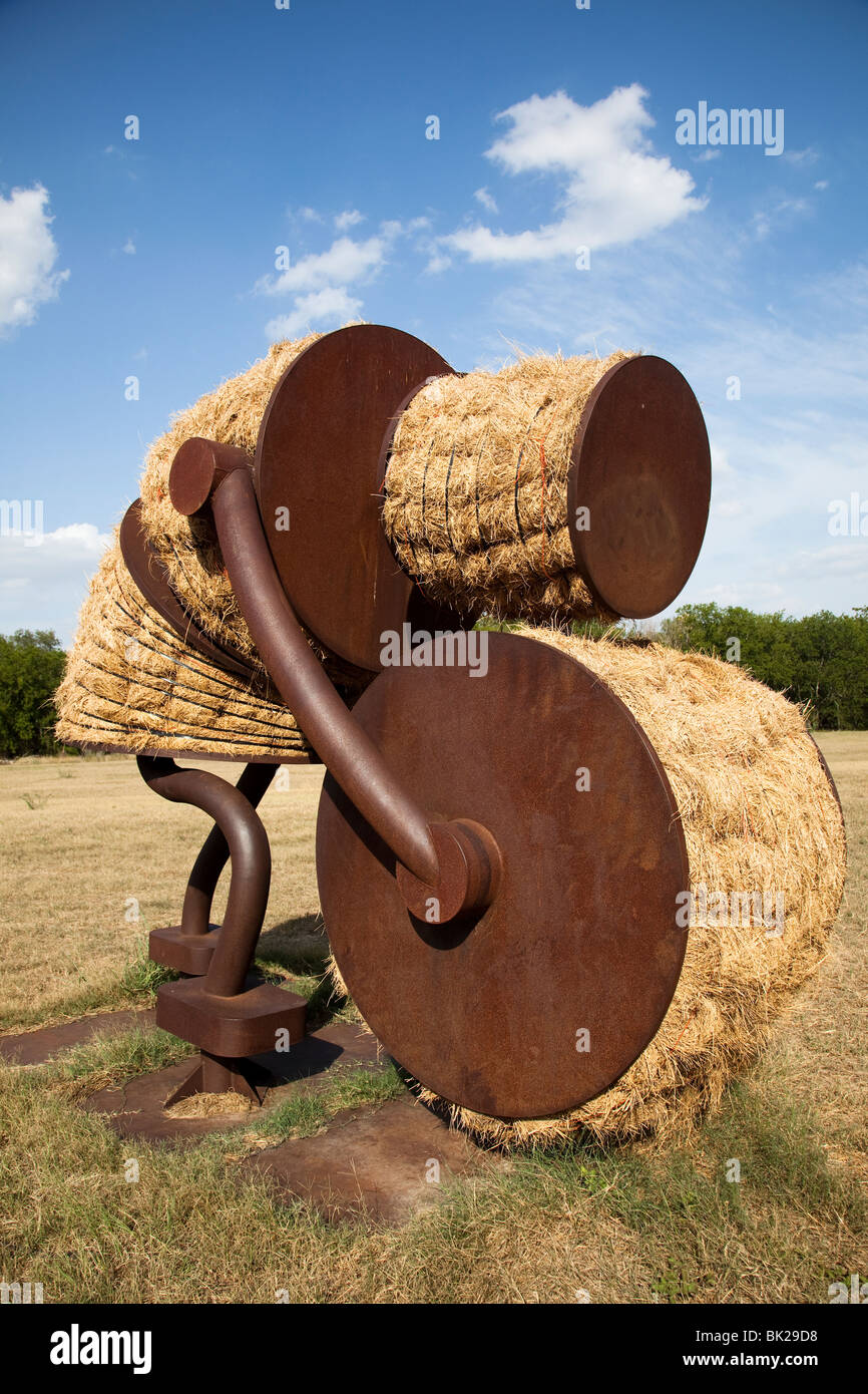 Art in field made from metal and straw San Antonio Texas USA Stock Photo