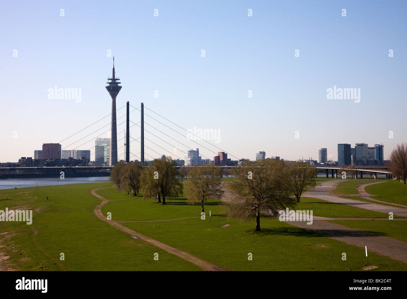 view of Dusseldorf from Oberkassel with Rhine tower, Mediaharbor and Rheinknie bridge Stock Photo