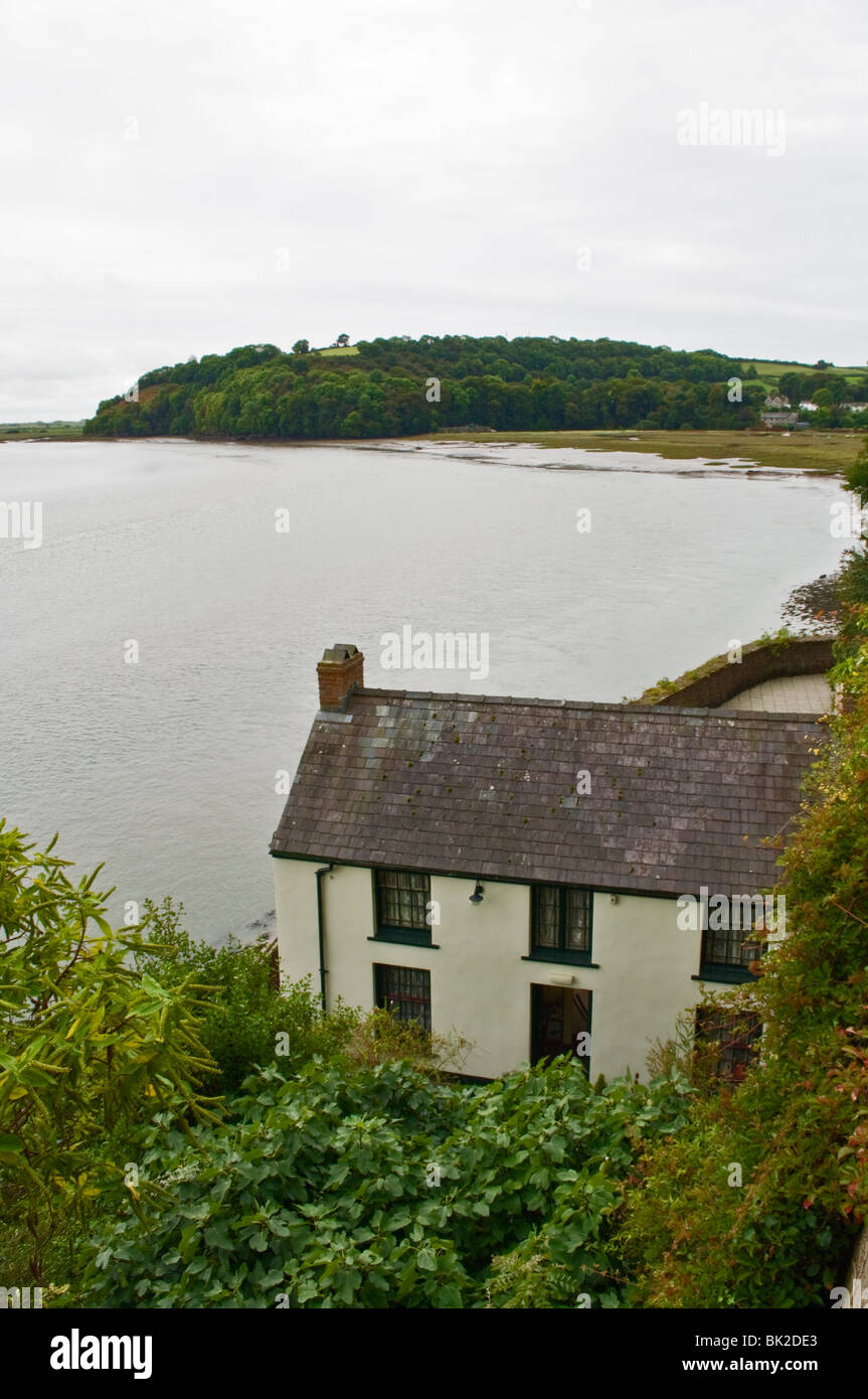 Looking towards Laugharne across the Taf Estuary from The Boathouse, the home of Dylan Thomas from 1949 to his death in 1953. Stock Photo