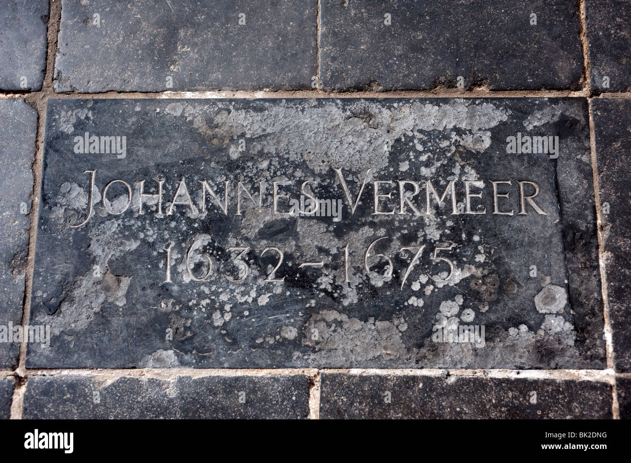 Floor plaque indicating resting place of artist Johannes Vermeer in Oude Kerk, Delft, The Netherlands Stock Photo