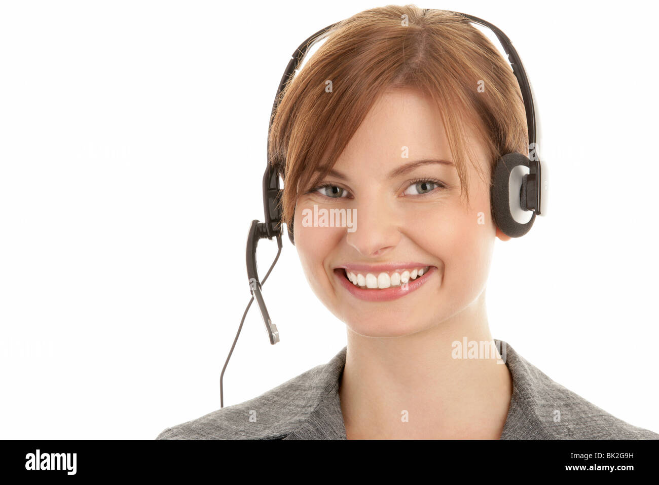 Young telephone operator wearing headset isolated on white background