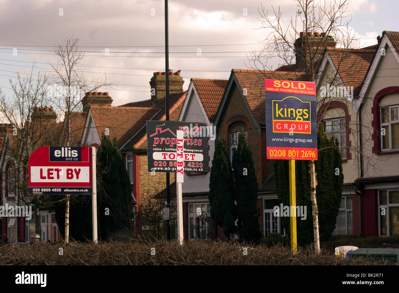 A row of for sale/ to Let  signs in Tottenham , North London England UK Stock Photo