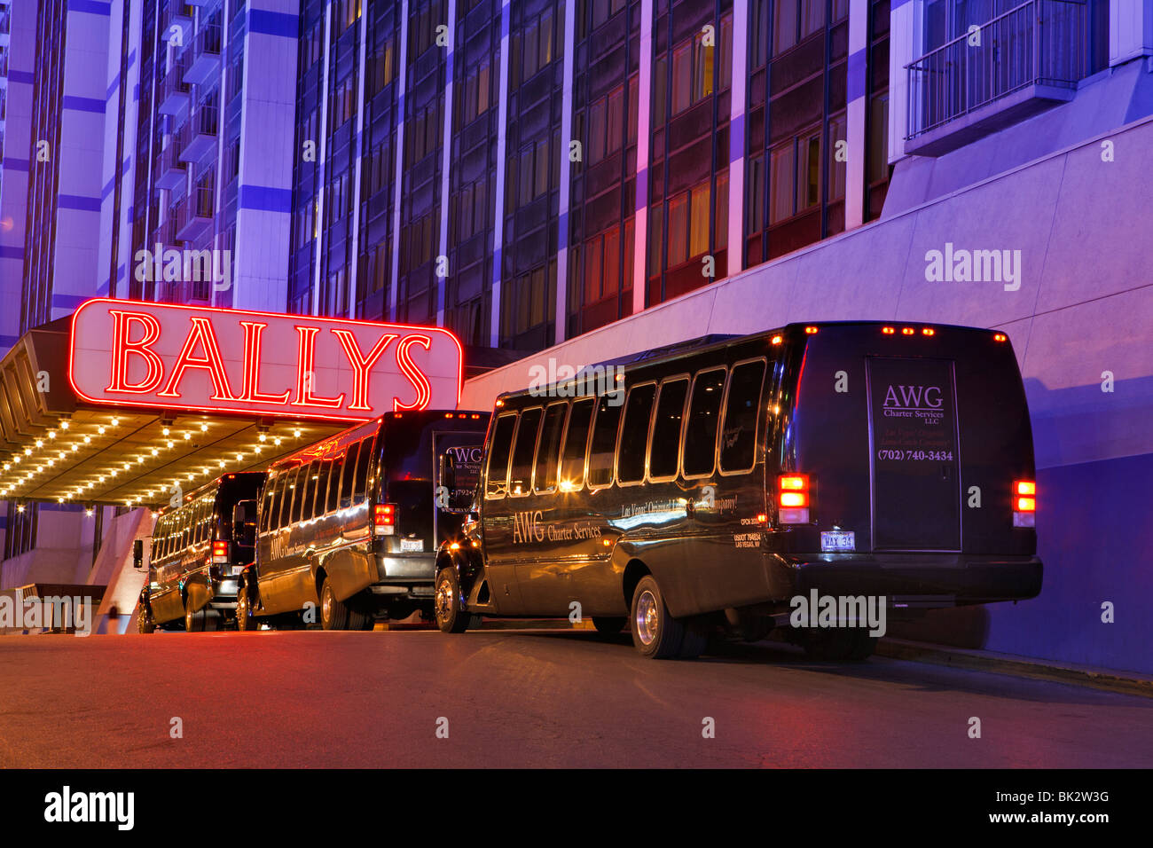 Tour buses outside Bally's casino. at night-Las Vegas, Nevada, USA. Stock Photo