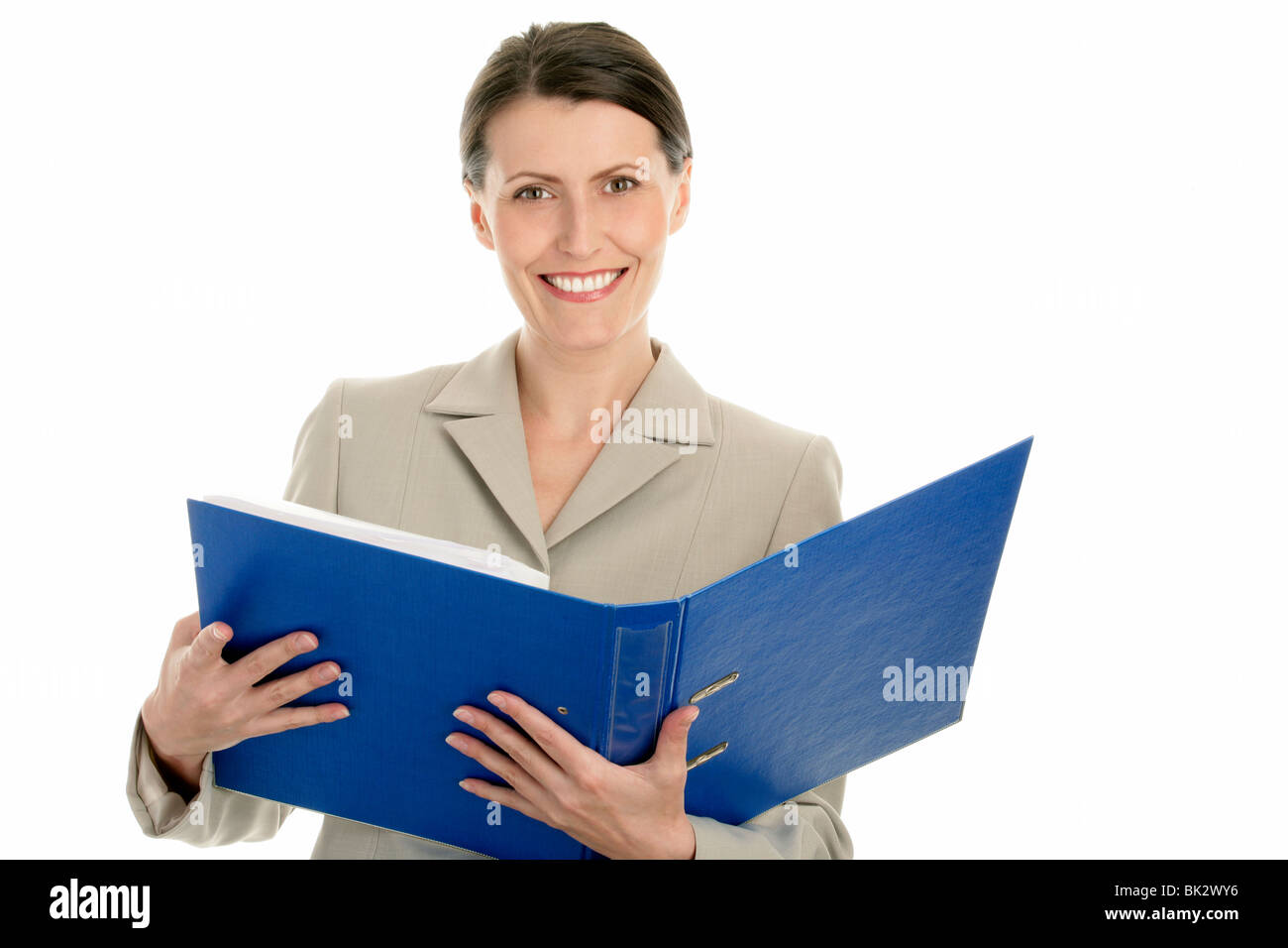 Mature businesswoman holding ring binder isolated on white background Stock Photo