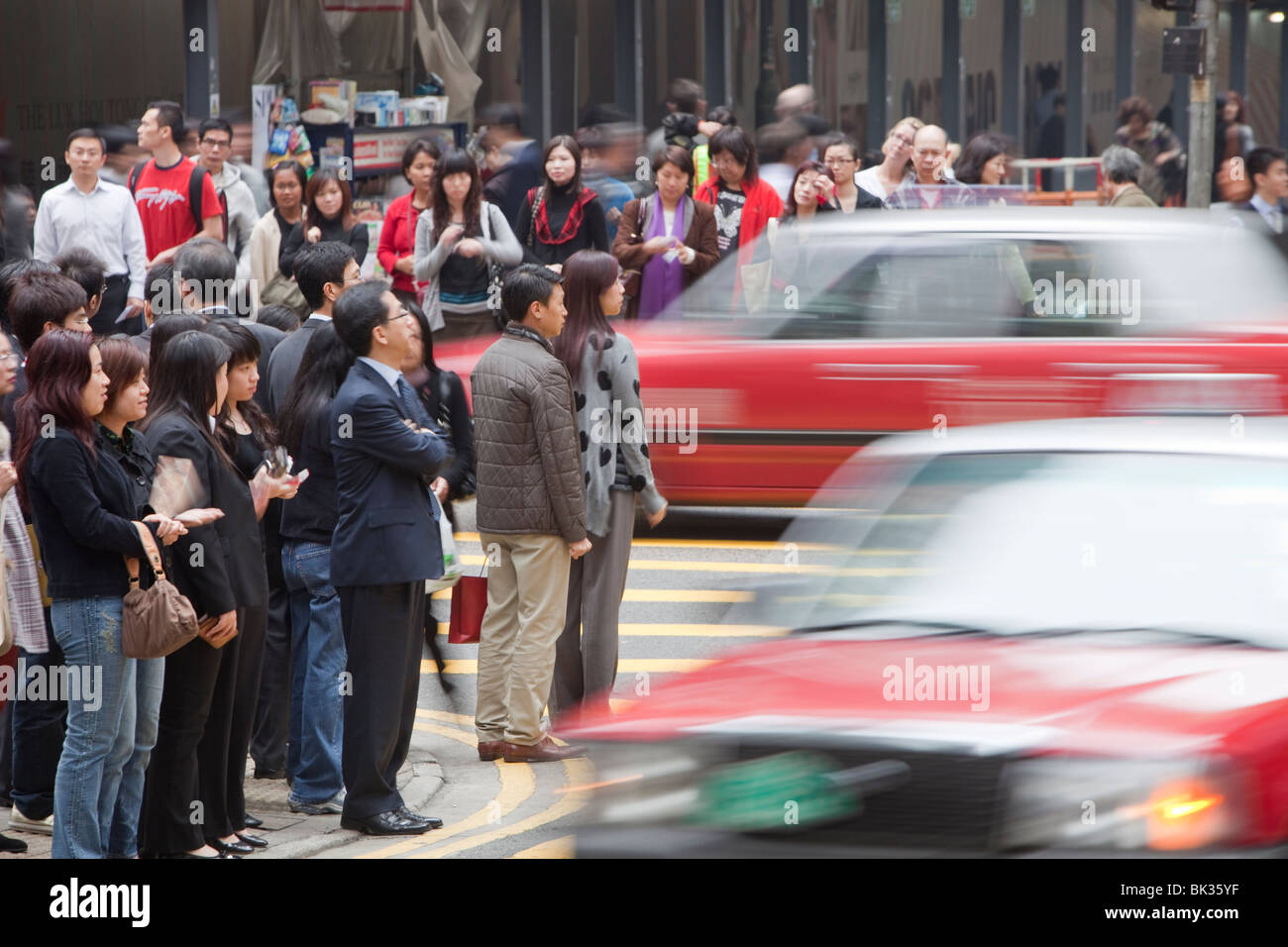 Crowds of people on the street in Hong Kong, China. Stock Photo