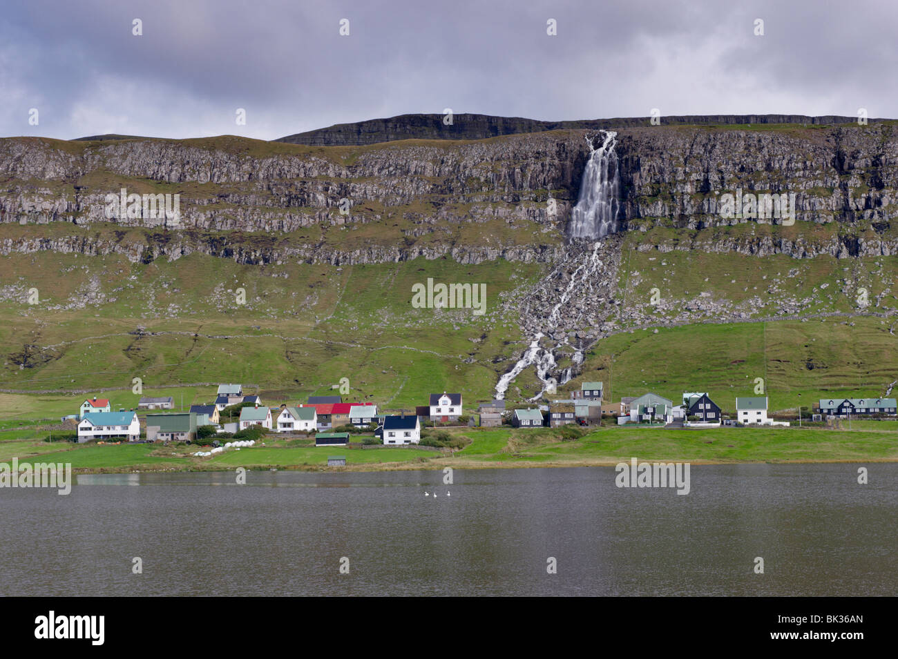 Houses at Sandur, across Sandsvatn lake, Sandoy, Faroe Islands (Faroes), Denmark, Europe Stock Photo