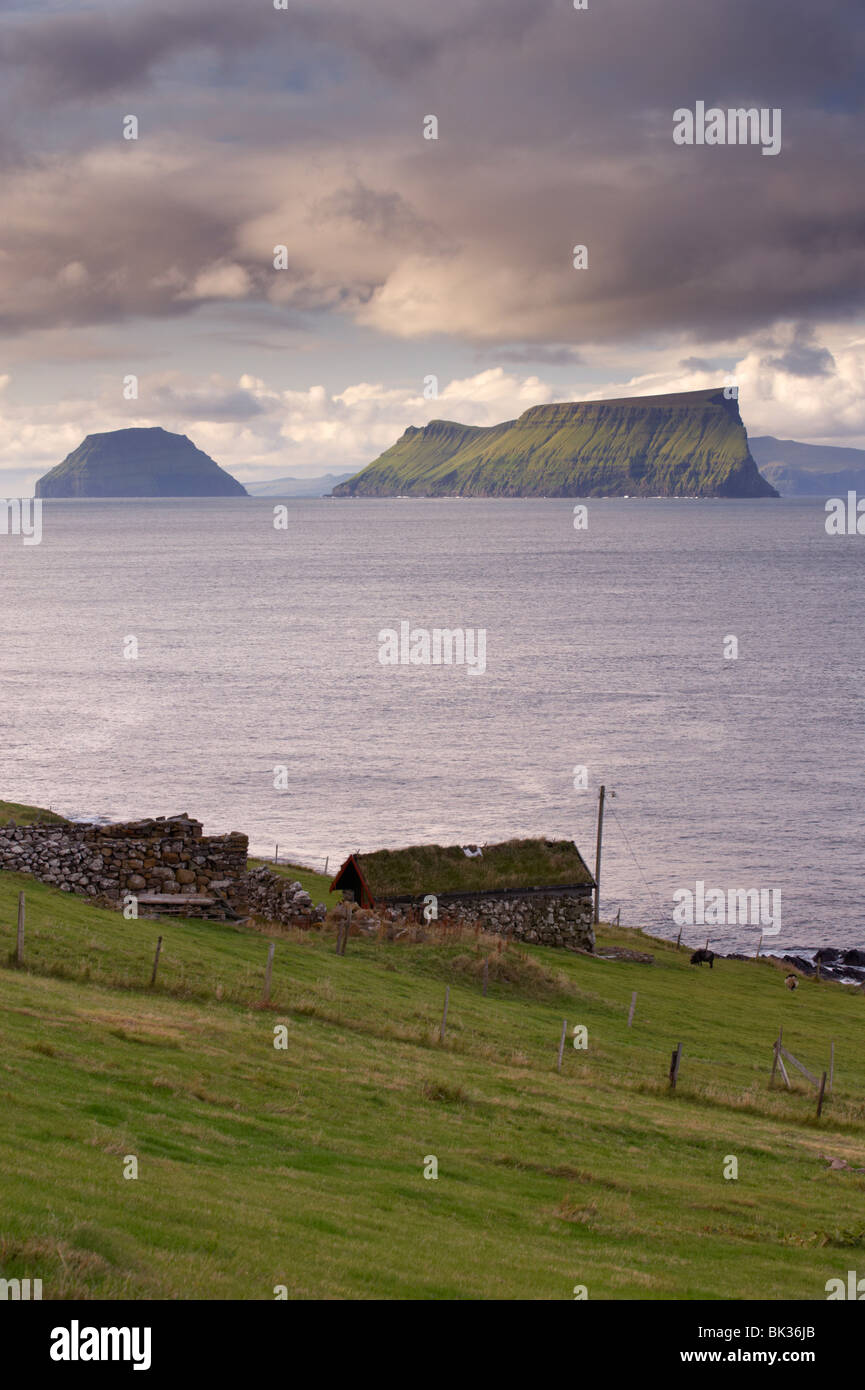 Islands of Stora Dimun on the right, and Litla Dimun, from Skarvanes, Sandoy Island, Faroe Islands (Faroes), Denmark, Europe Stock Photo