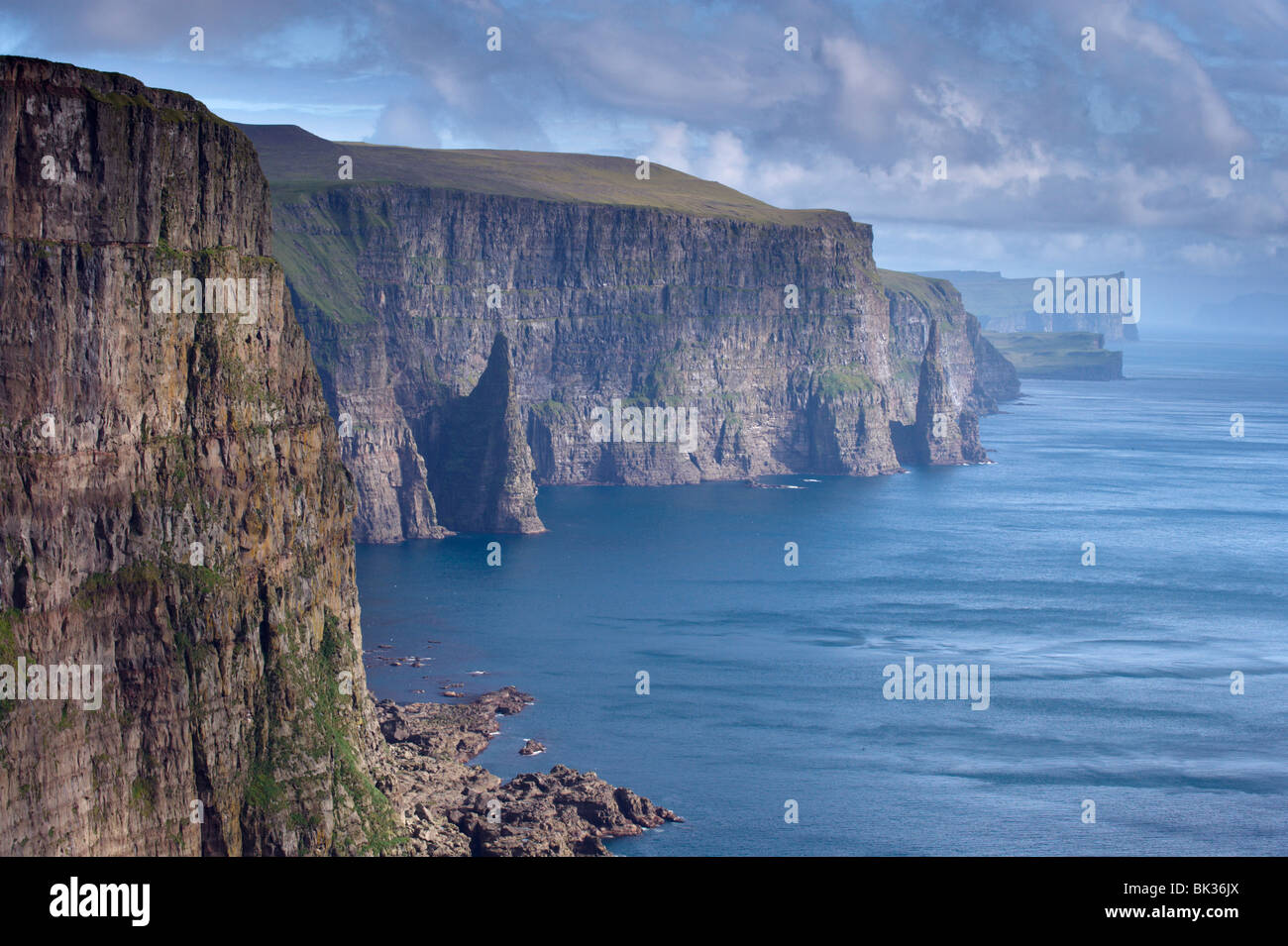 High cliffs between 200 and 300m high, on west coast of Sandoy, Faroe Islands Stock Photo