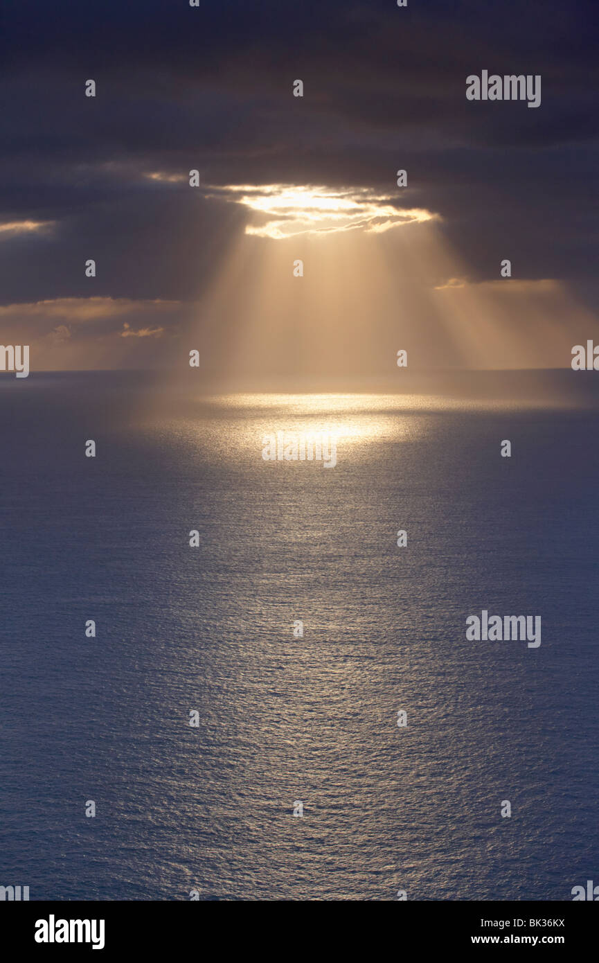 Sunrays over the ocean, west coast of Sandoy, Faroe Islands (Faroes), Denmark, Europe Stock Photo