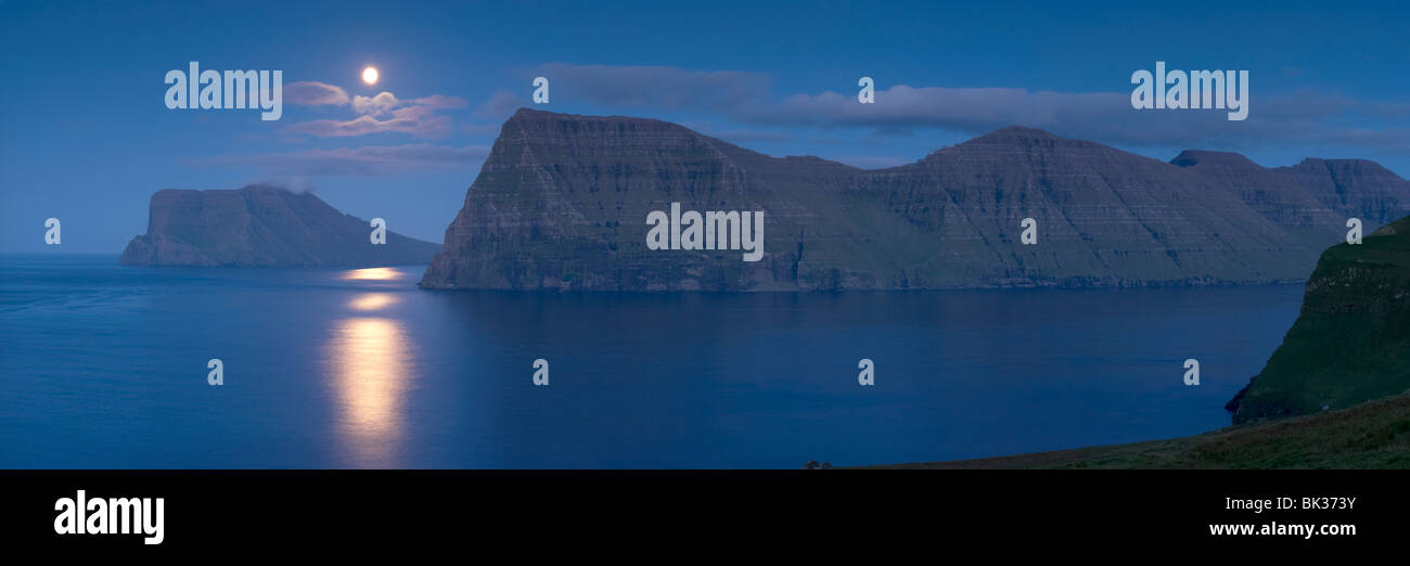 Moonrise on Kunoy and Vidoy headlands across Kalsoyarfjordur, from Kalsoy Island, Nordoyar, Faroe Islands Stock Photo