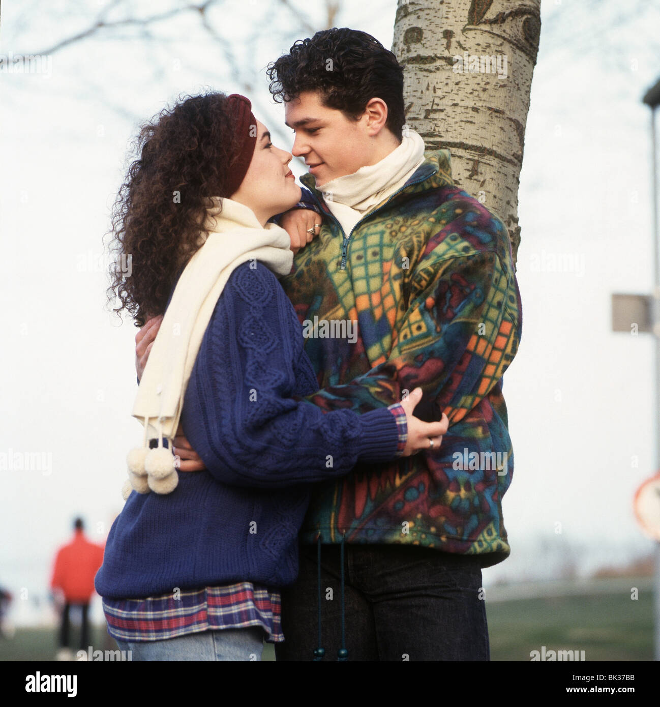 Teenage couple in love cuddling hi-res stock photography and images - Alamy