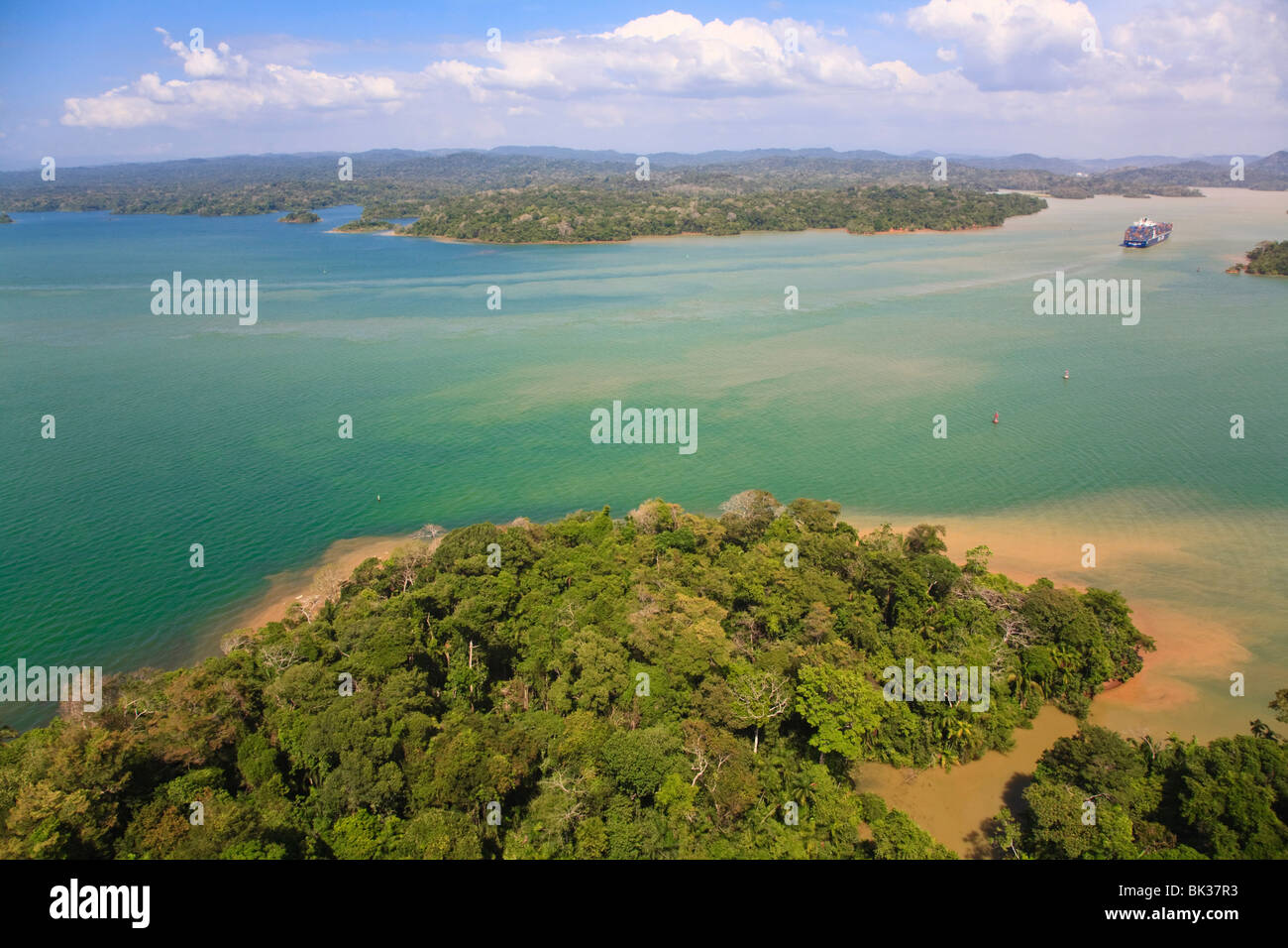 Container ship transiting Panama Canal, Gatun Lake, Panama, Central America Stock Photo