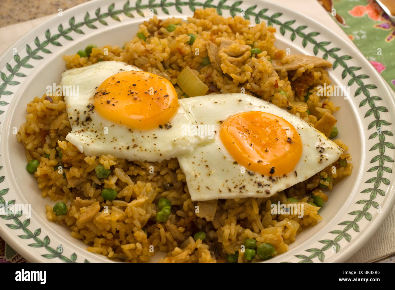 Nasi Goring, Indonesian fried rice with eggs and pork Stock Photo