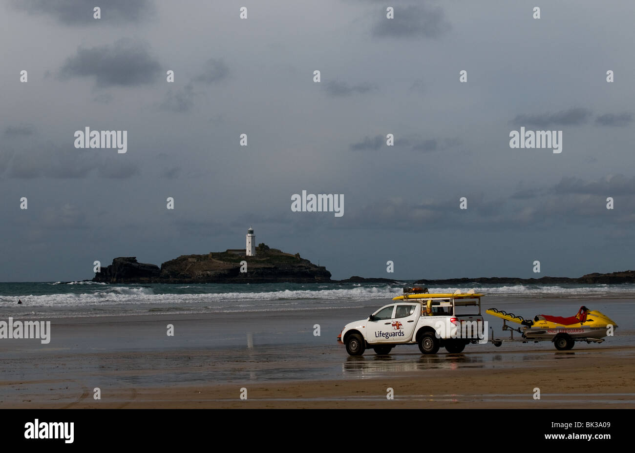 A RNLI patrol vehicle parked on Gwithian Towans beach in Cornwall.  Photo by Gordon Scammell Stock Photo