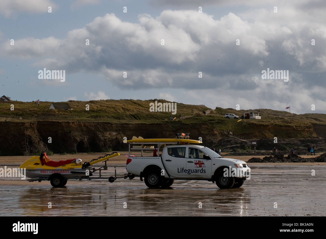 A RNLI patrol vehicle parked on Gwithian Towans Beach in Cornwall.  Photo by Gordon Scammell Stock Photo