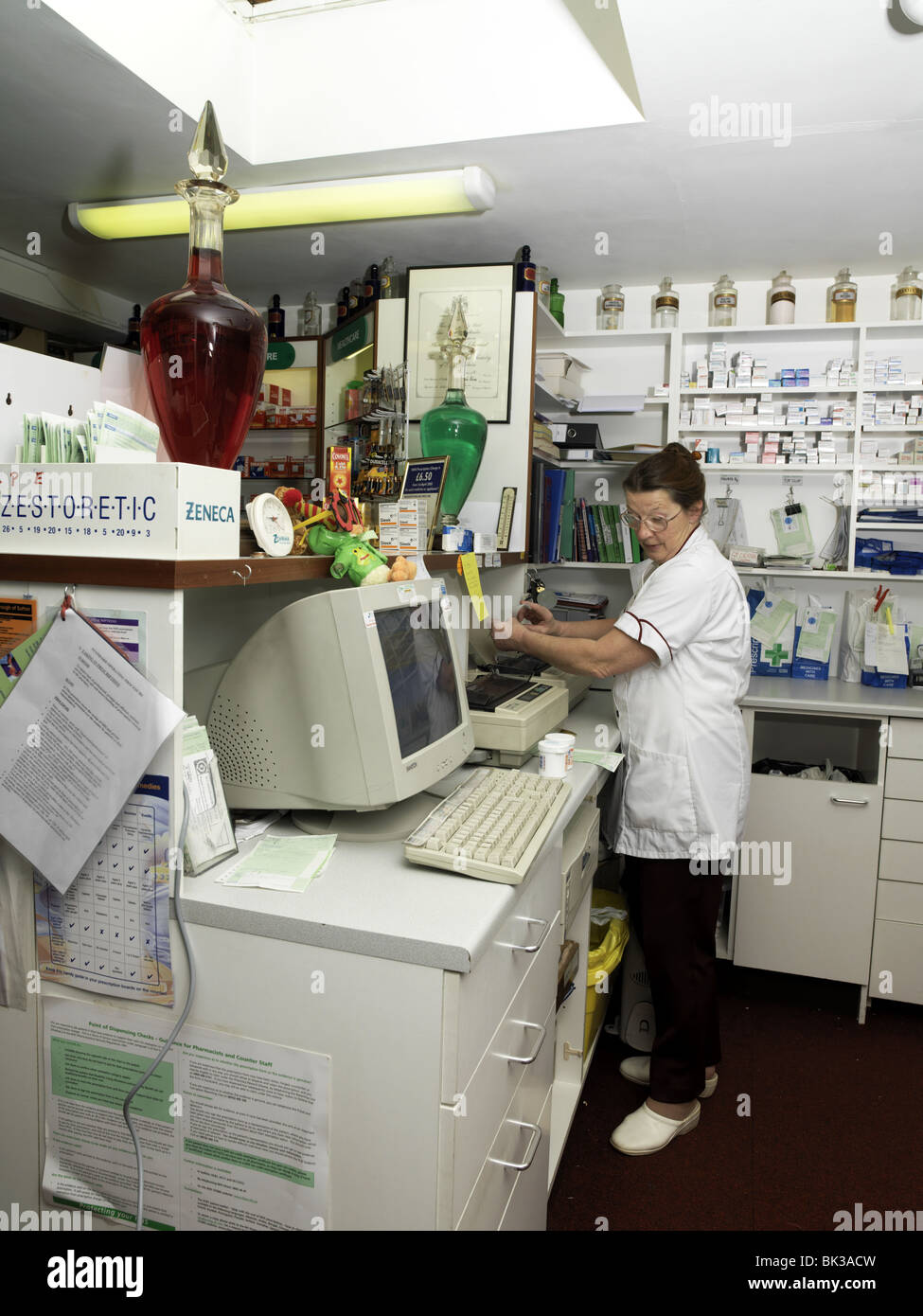 Cheam Surrey England Pharmacist Working In Chemist Stock Photo - Alamy