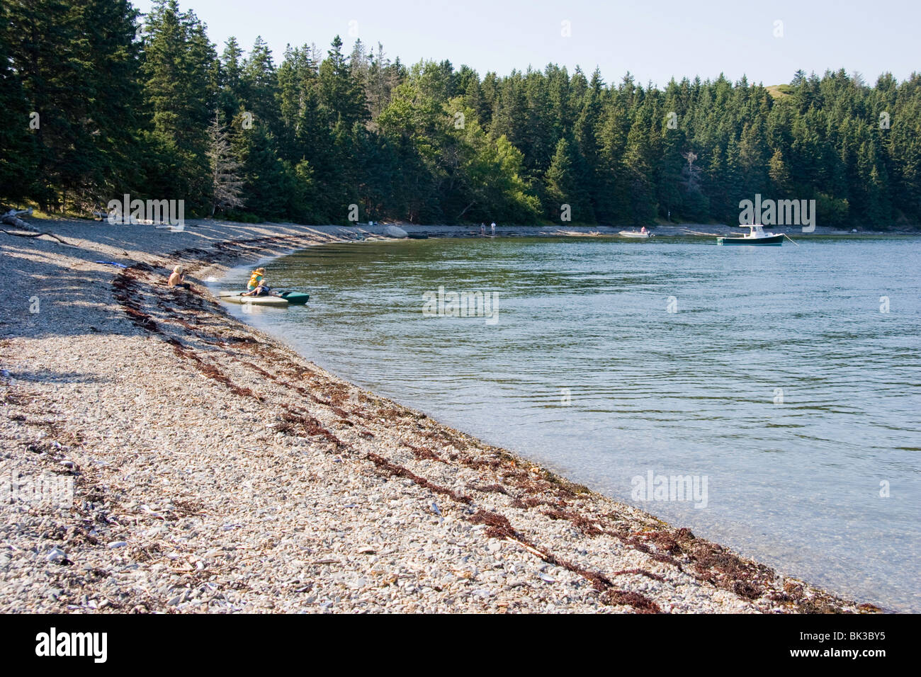 Maritime beach and kayaks hires stock photography and images Alamy