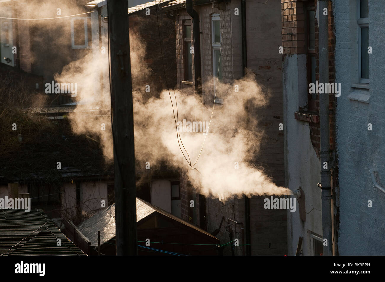 Steam from central heating vent, Greater Manchester, UK Stock Photo Alamy