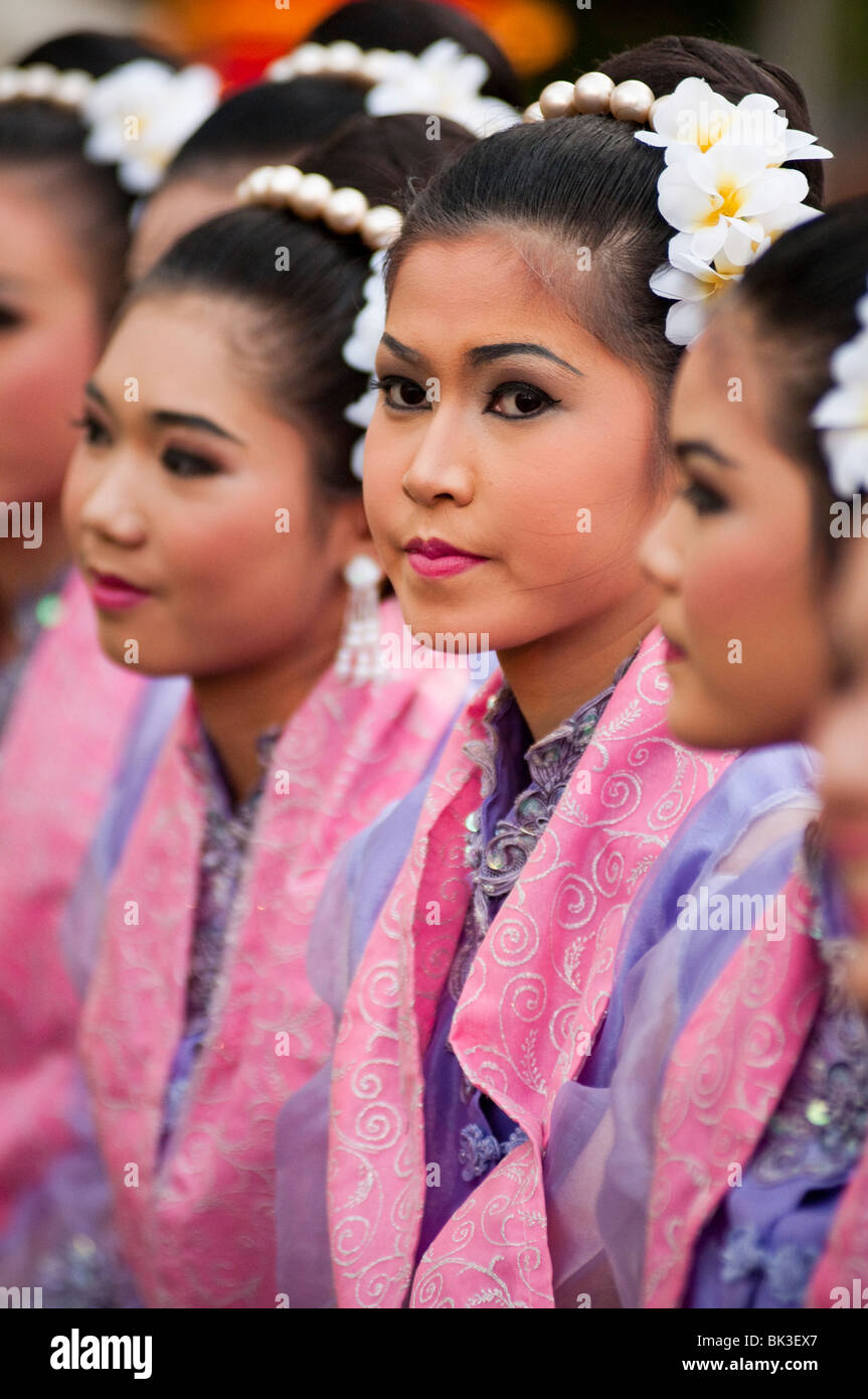 Young Thai women in traditional costume at Thailand Tourism Authority Golden Jubilee Grand Reception; Bangkok, Thailand. Stock Photo