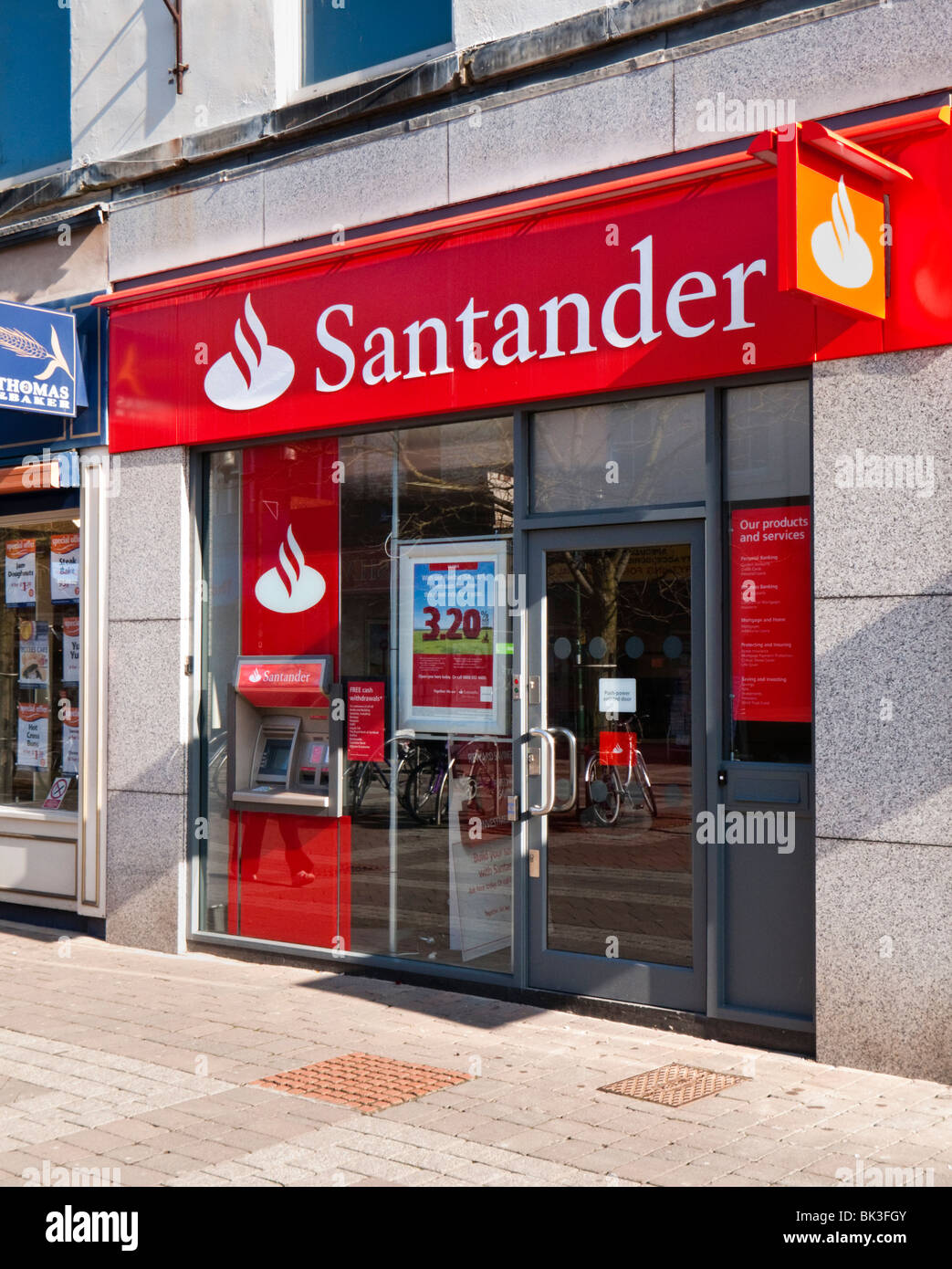 Santander bank branch with signs and logo England, UK Stock Photo