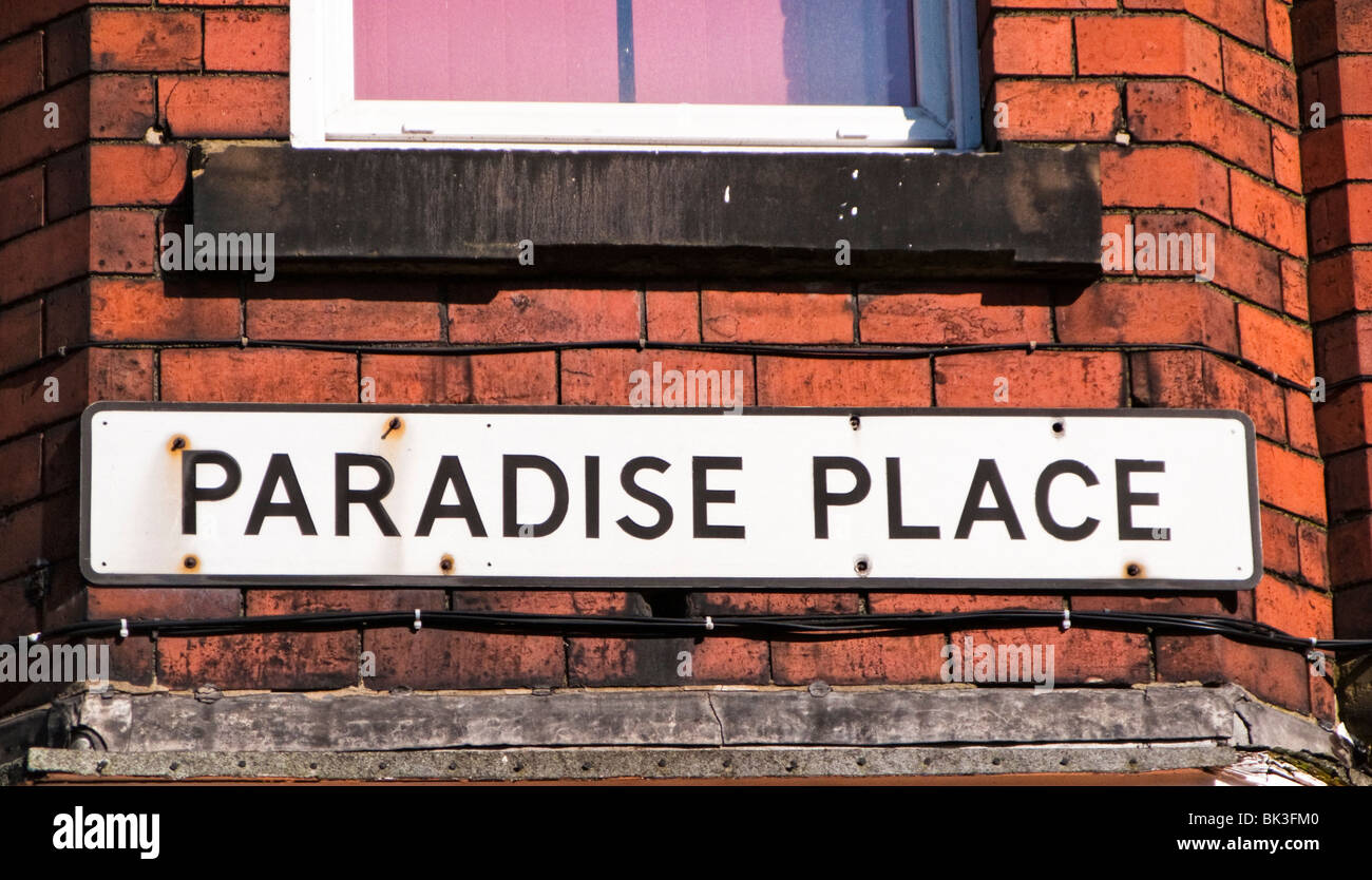 Close up of British English street sign name, England, UK - Paradise Place Stock Photo