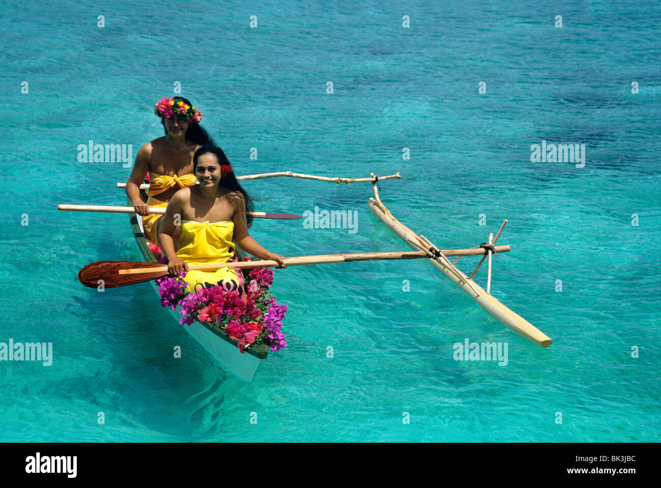 Outrigger canoe in the lagoon on the island of Huahine in the Society