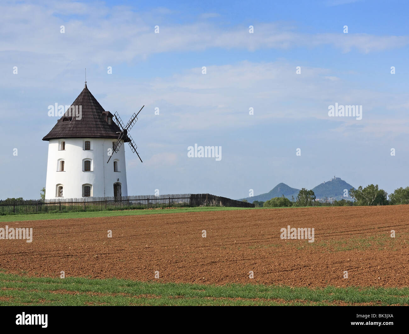 Old white windmill Stock Photo
