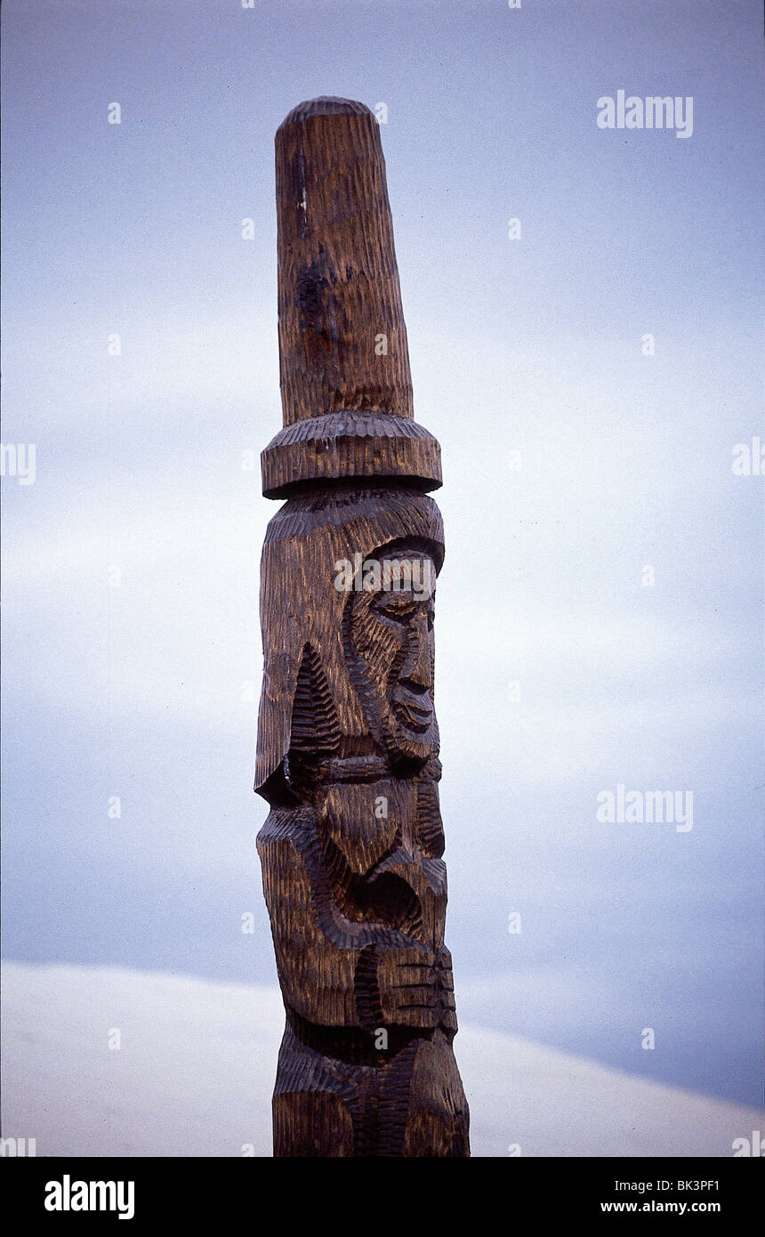 Detail of the top of a carved wooden totem pole sculpture in Alaska ...