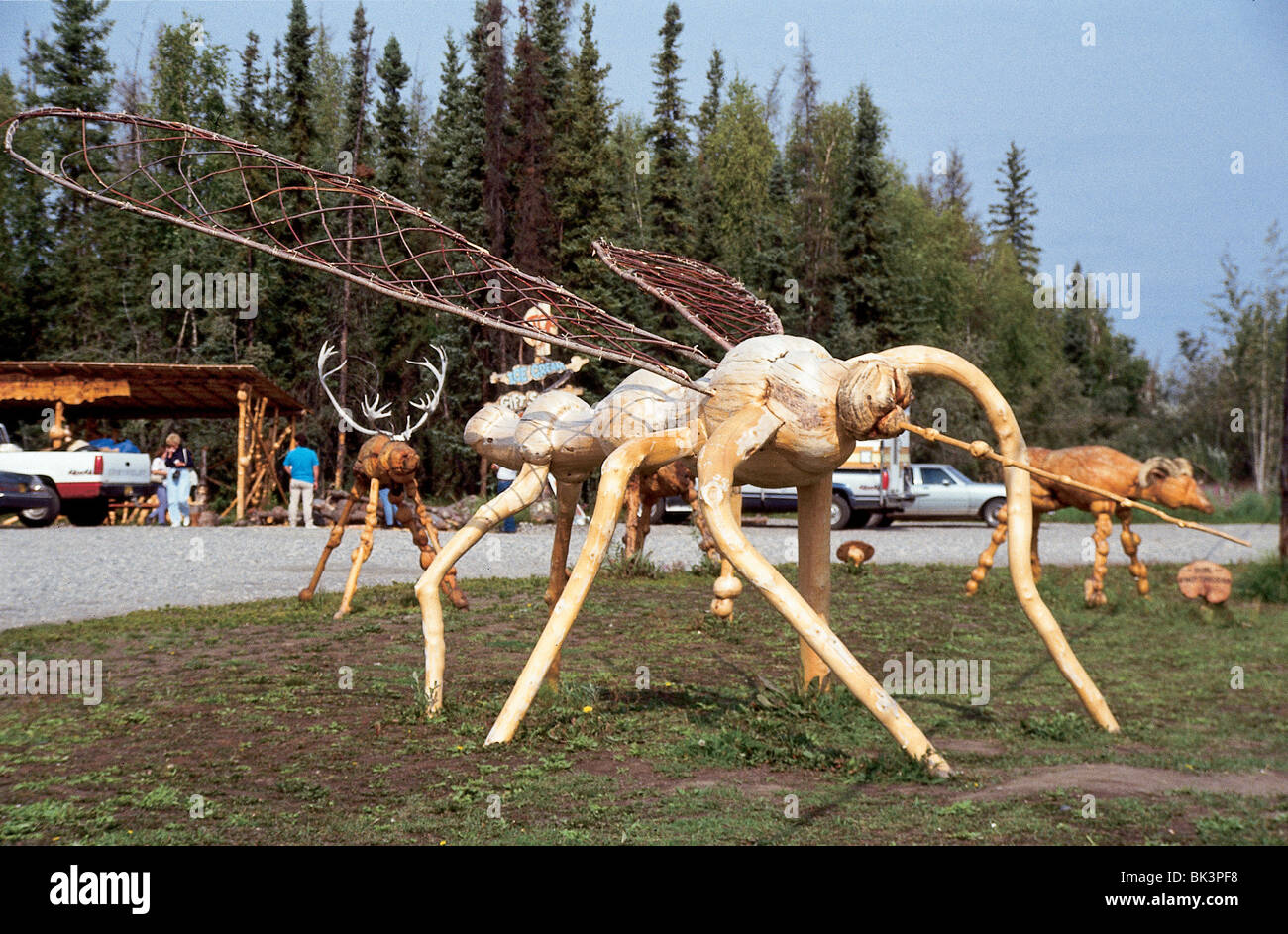 Mosquito sculpture assembled from wood burls, Alaska Stock Photo