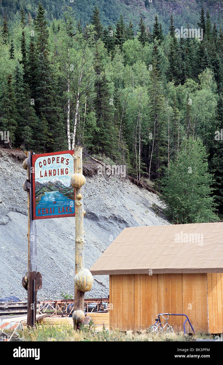 Wood Posts With Burls Supporting A Hand Painted Sign For Cooper