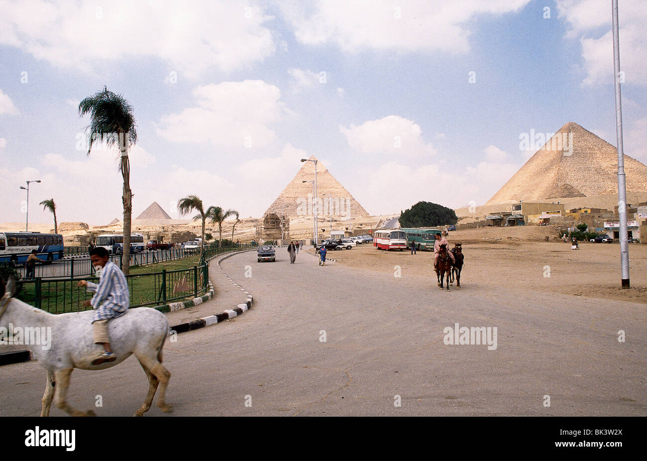 Tourists at the Great Pyramids of Giza, Egypt Stock Photo