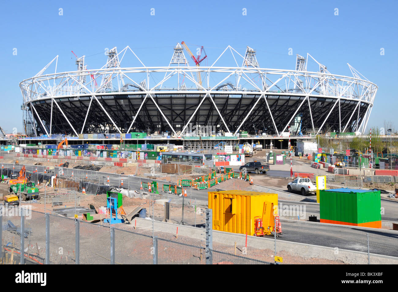 Cranes at Stratford 2012 Olympic & Paralympic Games sports stadium building industry construction site work in progress Newham East London England UK Stock Photo