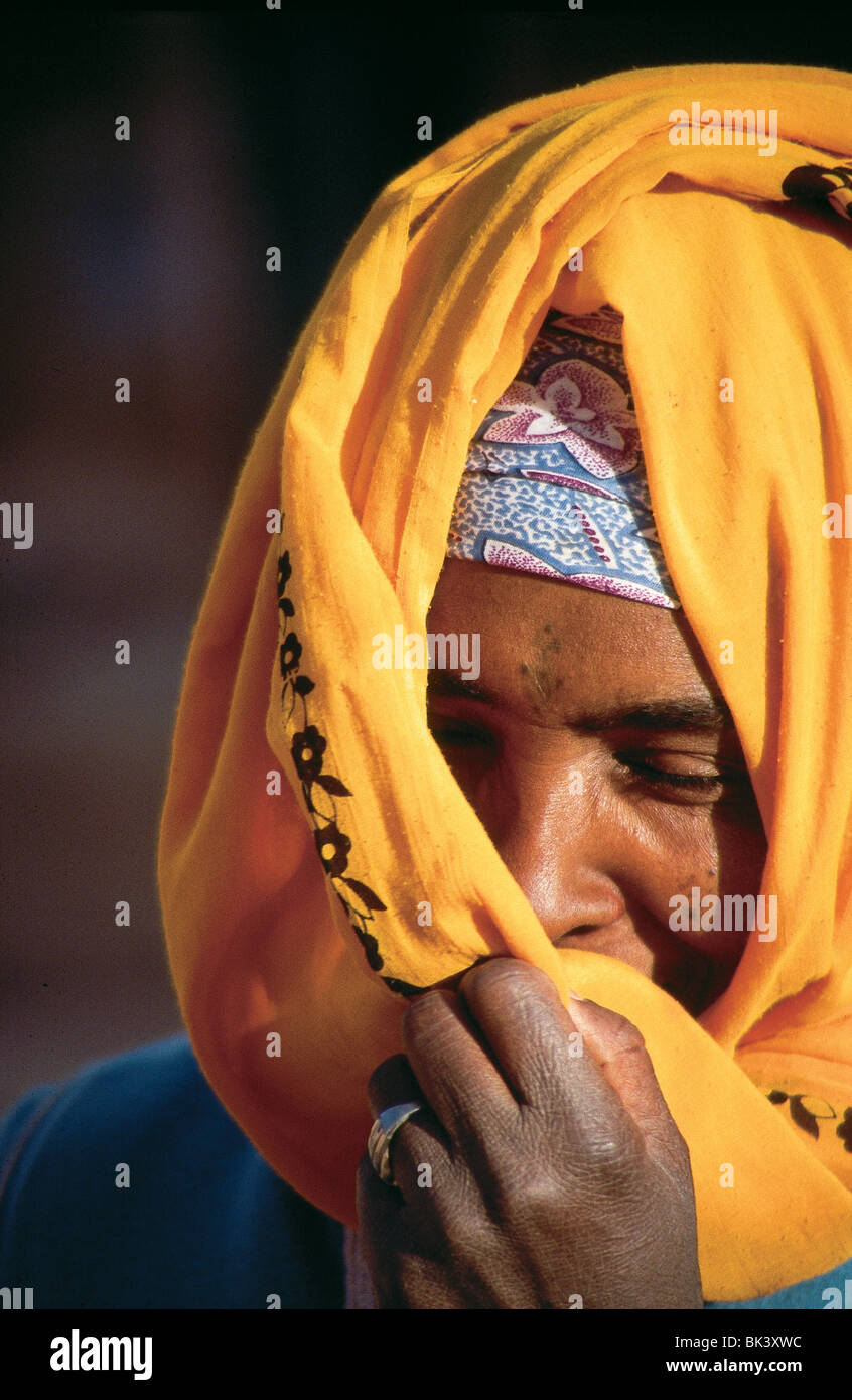 Closeup portrait of a woman wearing a hijab headscarf partially