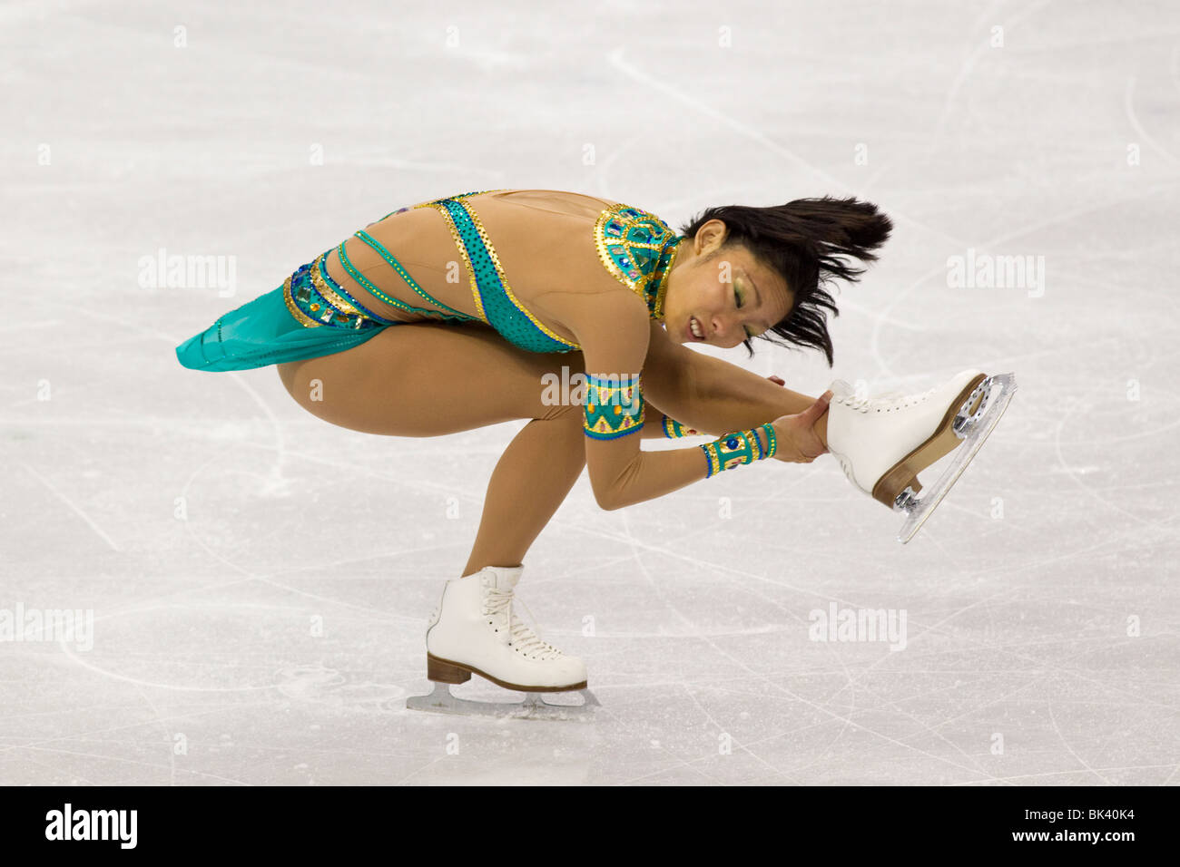 Miki Ando (JPN) competing in the Figure Skating Ladies Free Program at the 2010 Olympic Winter Games Stock Photo