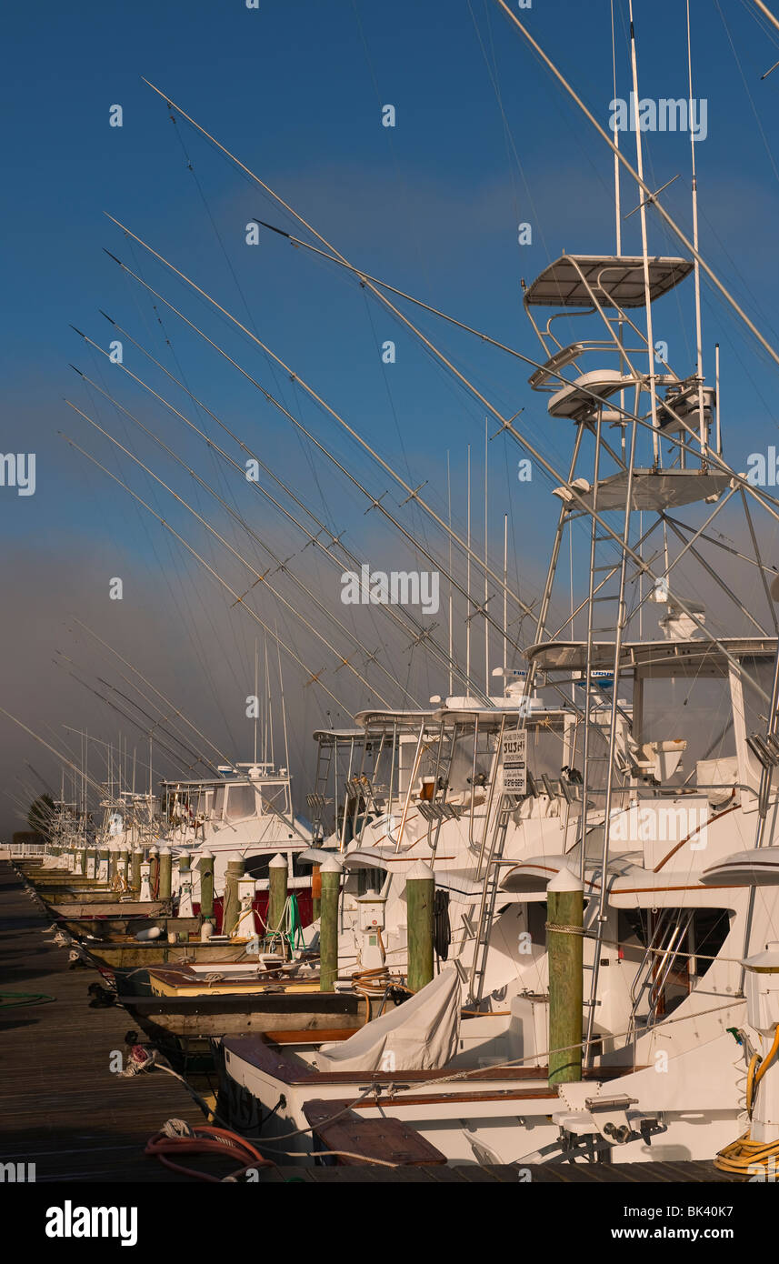 Fishing boats in Manteo, North Carolina. Patiently awaiting their work