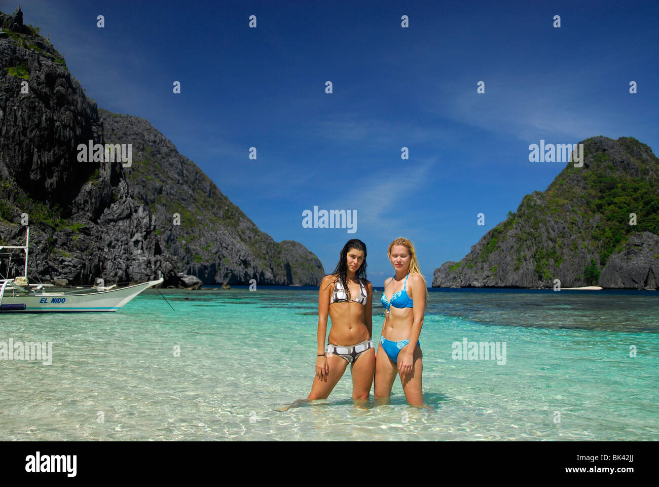 Young girls on the beach in El Nido area, Palawan, Philippines, Southeast Asia Stock Photo