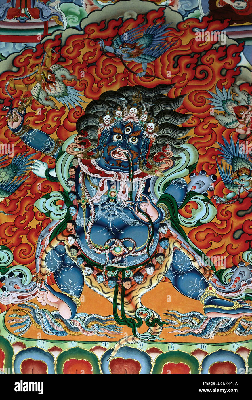 Detail of a Buddhist mural depicting a terrifying deity, Kingdom of Bhutan Stock Photo