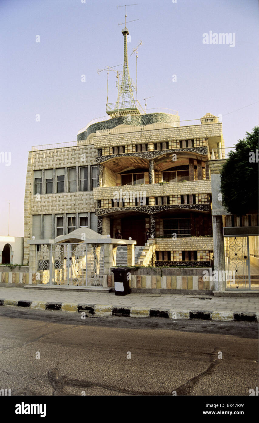 Built structure in Amman, Jordan with a rooftop antenna shaped like a
