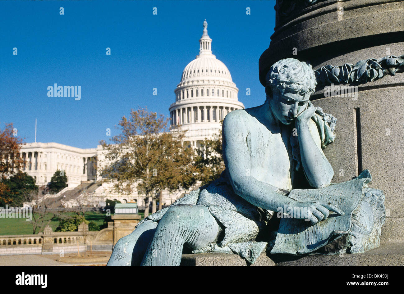 Bronze sculpture and the U.S. Capitol Building in Washington, D.C. Stock Photo