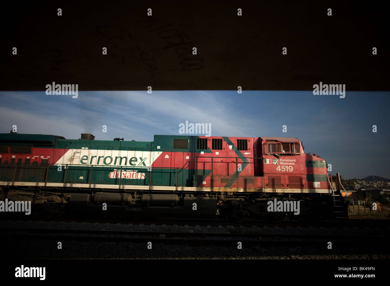 A cargo train moves across the tracks in Mexico City, Mexico, February 12, 2010. Stock Photo