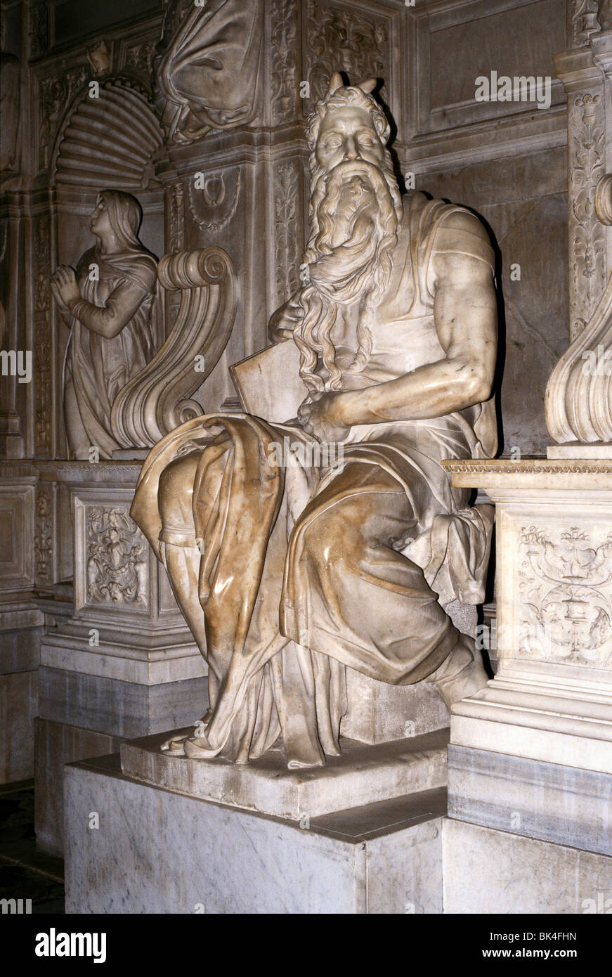 Michelangelo's 16th century sculpture of Moses at the tomb of Pope Julius II inside San Pietro in Vincoli, Rome, Italy Stock Photo