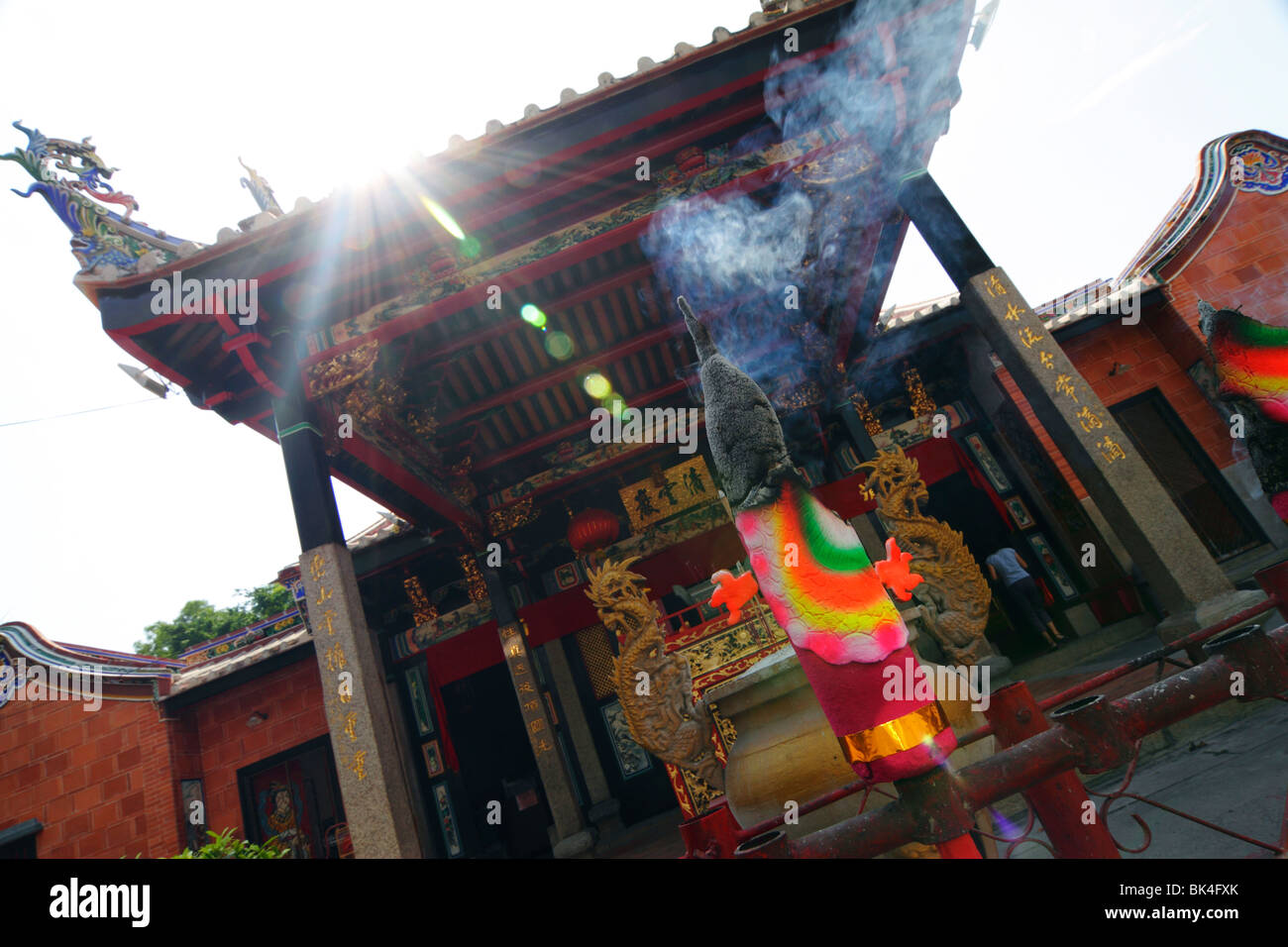 A big stick of incense burning in front of the Snake Temple in Penang, Malaysia Stock Photo