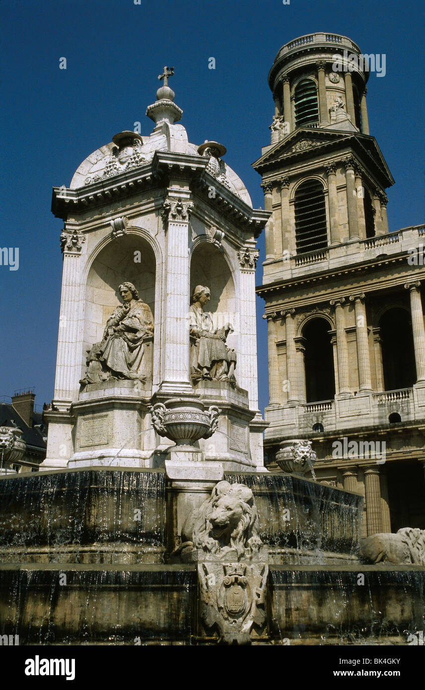 1844 fountain by Visconti displays sculpted likenesses of four bishops of Louis XIV era in front of church Saint-Sulpice Paris Stock Photo