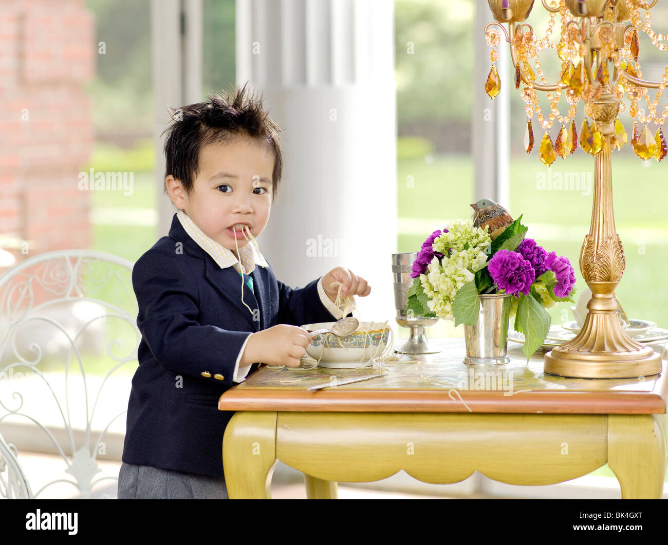 Boy 3 years eating at table hi-res stock photography and images - Alamy