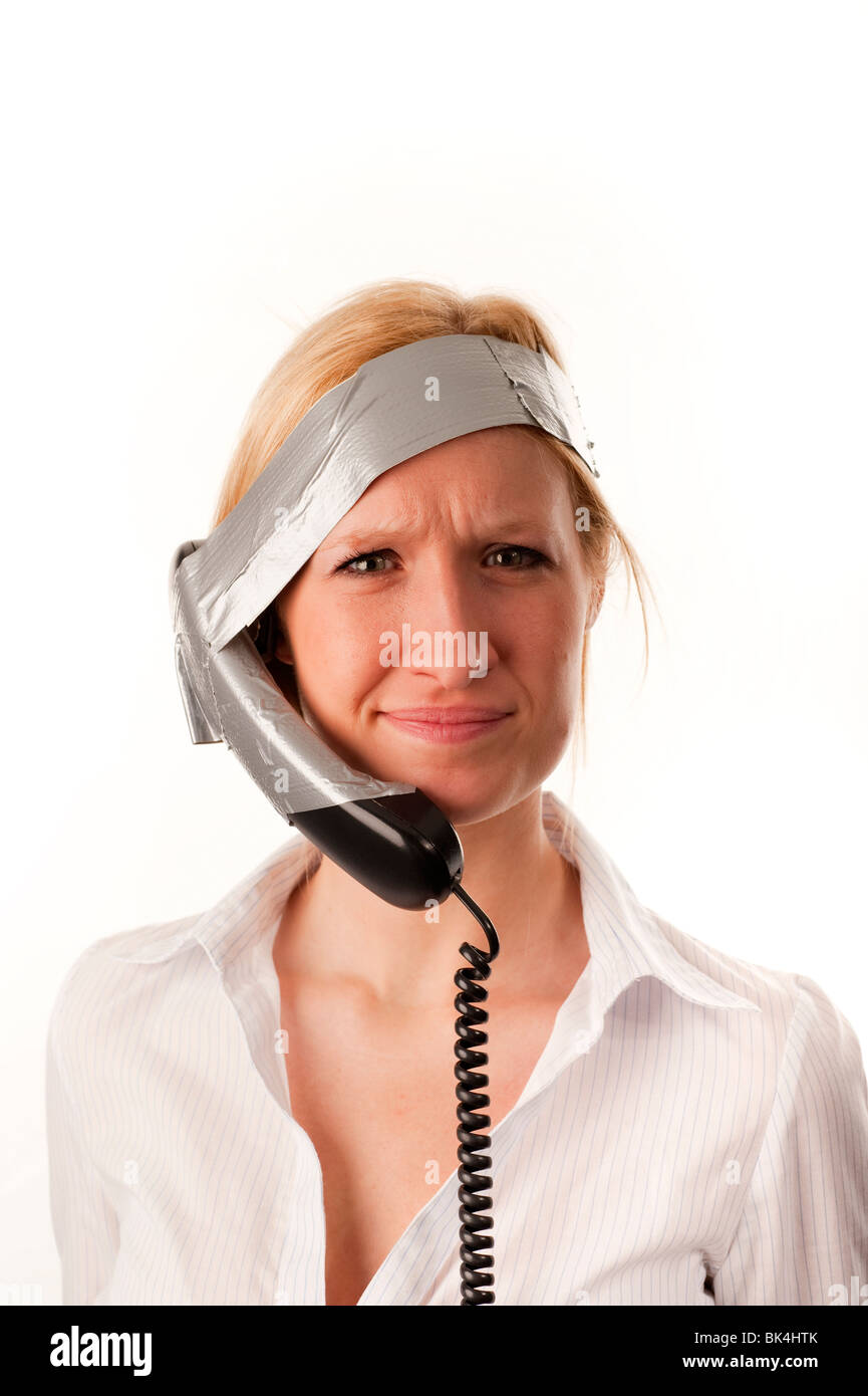 Phone handset taped to head FULLY MODEL RELEASED Stock Photo Alamy