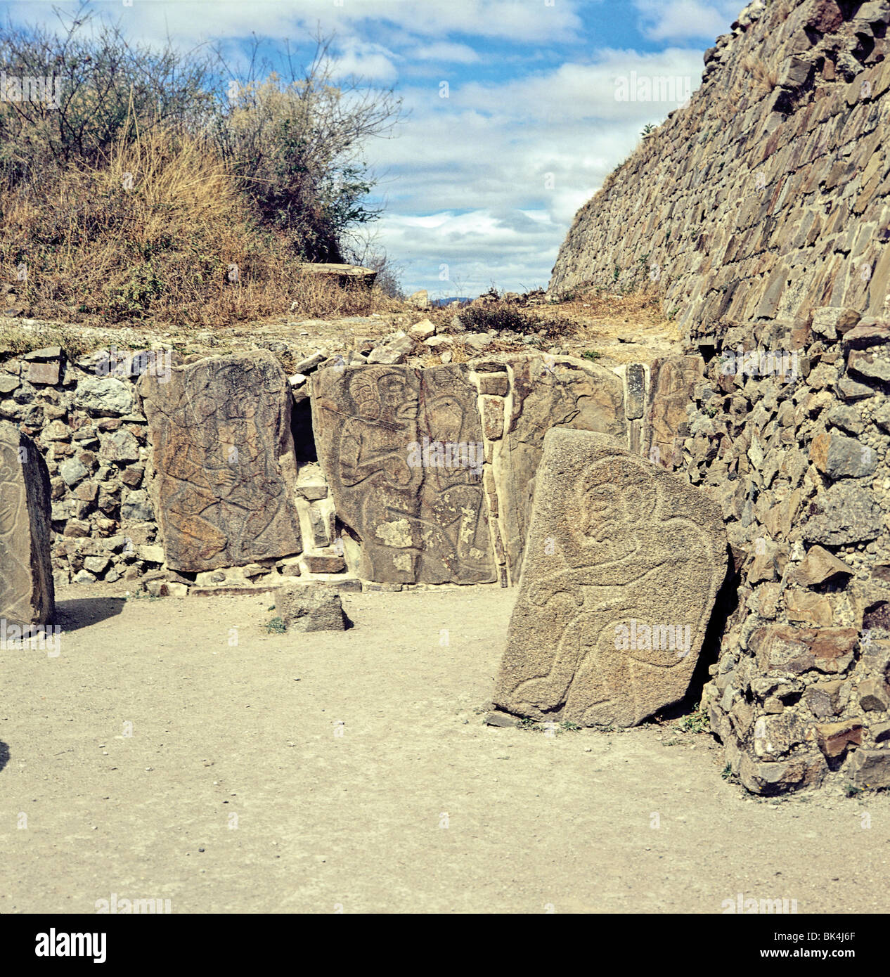 Building of Danzantes showing Tableros of Dancers from Sculptural Program at pre-Columbian site of Monte Alban in State of Stock Photo