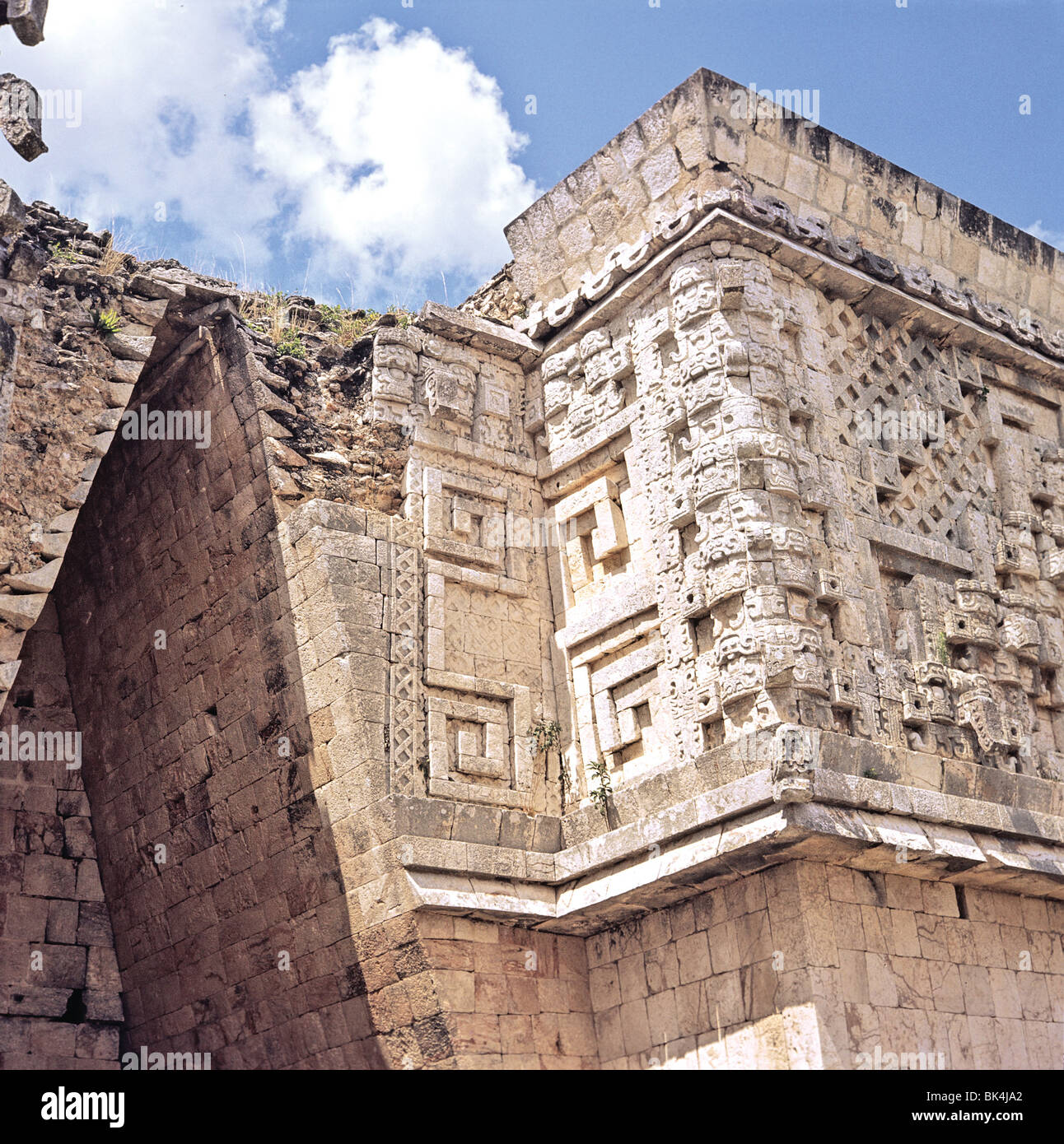 A Corbel Arch And Relief Sculpture Depicting The Masks Of The Rain
