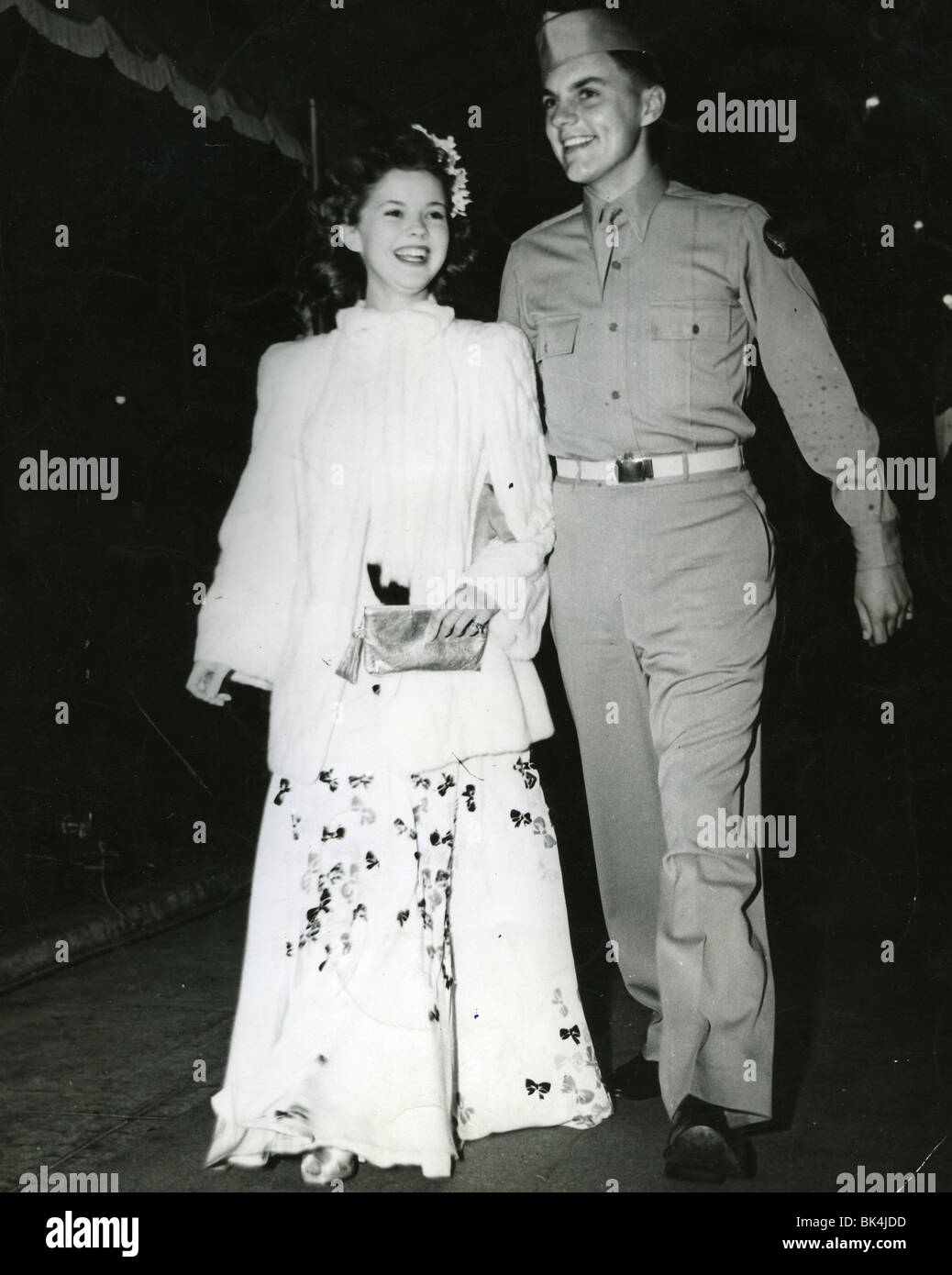 SHIRLEY TEMPLE with husband to be John Agar at the 1944 premiere of SINCE YOU WENT AWAY Stock Photo