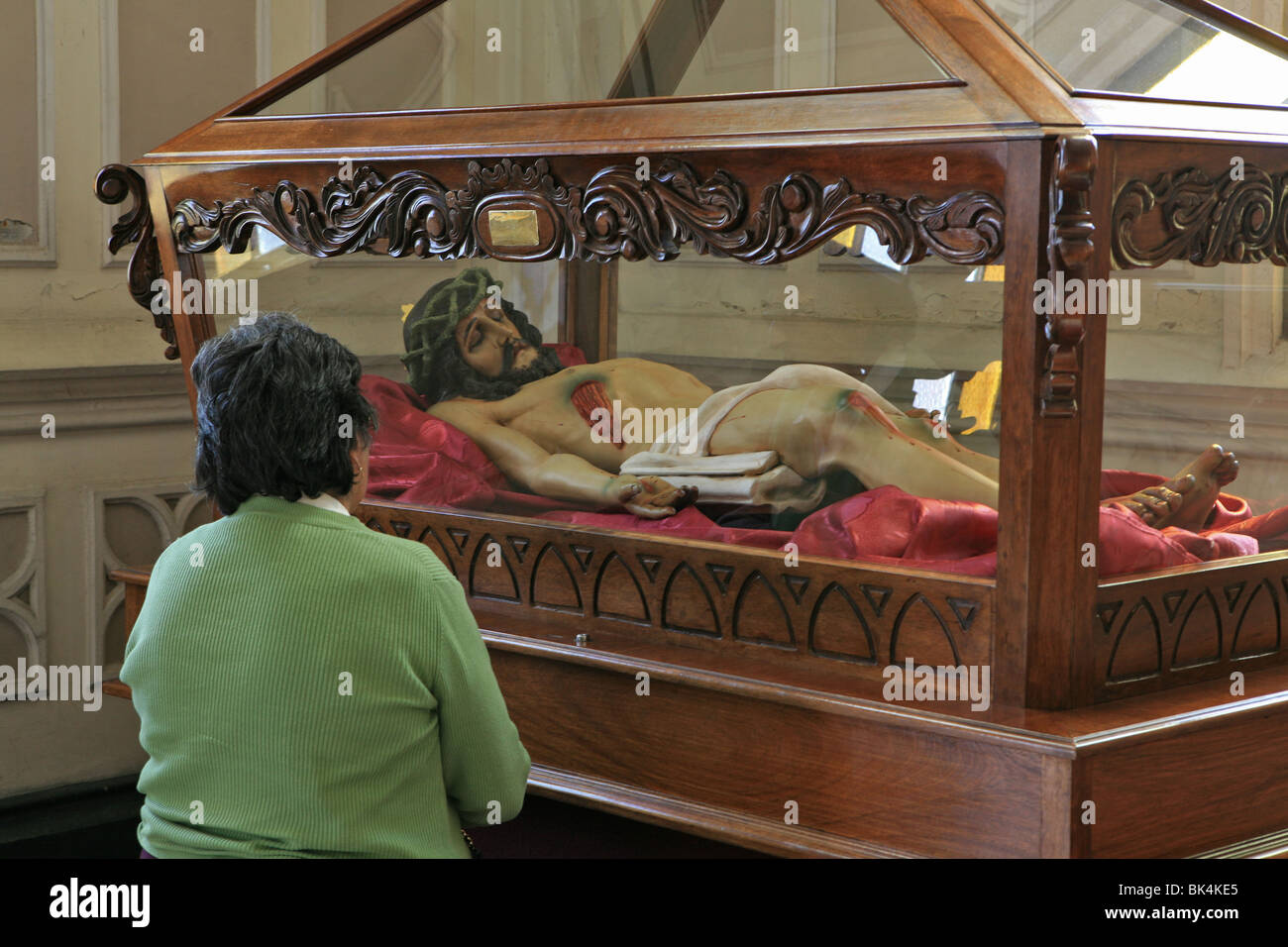 Woman inside of San Marcos Church, Arica, Chile Stock Photo